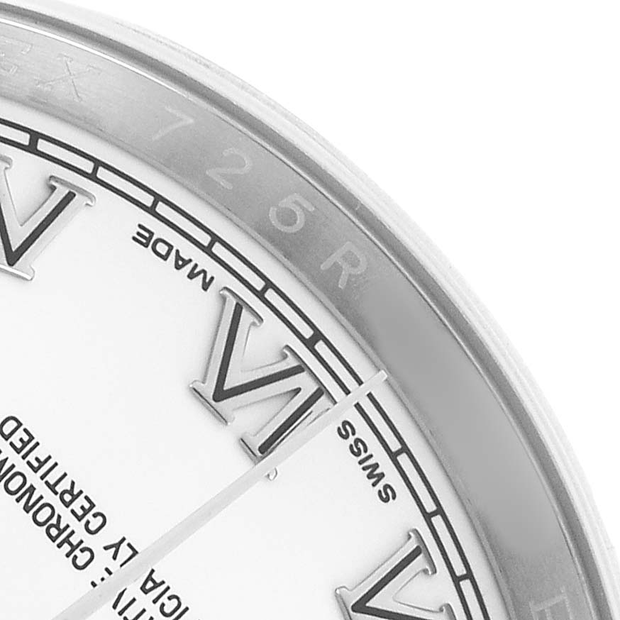 The image shows a close-up of the dial and bezel of a Rolex Datejust 116200 Men's Stainless Steel White Dial, featuring Roman numerals and part of the chapter ring.