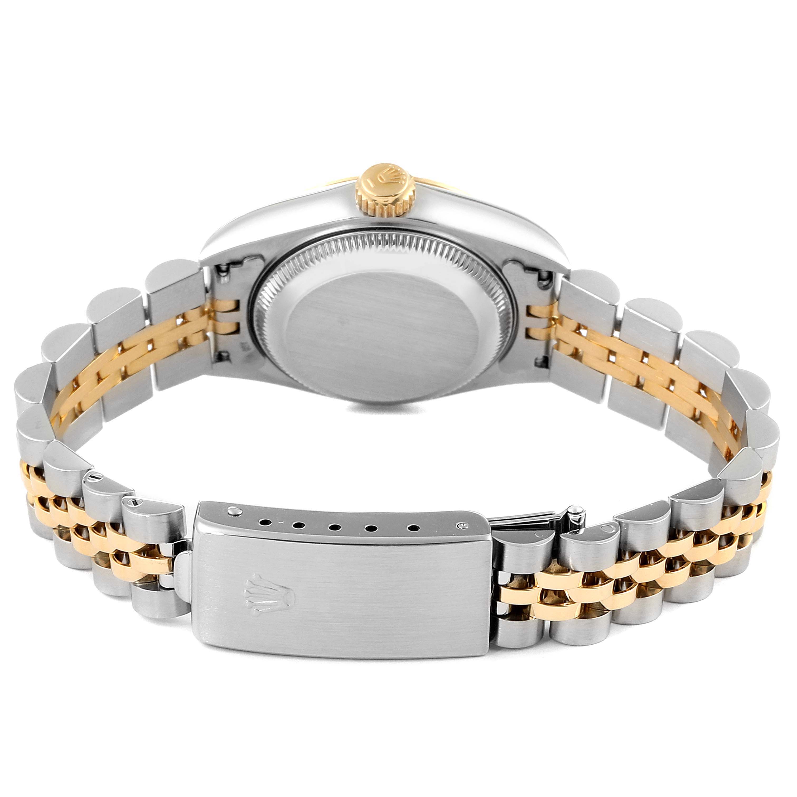 The image shows the back case, crown, and Jubilee bracelet of a Rolex Datejust 69173 Women
s Steel and Gold (two tone) Silver Dial 69173 Women
s Steel and Gold (two tone) Silver Dial watch.