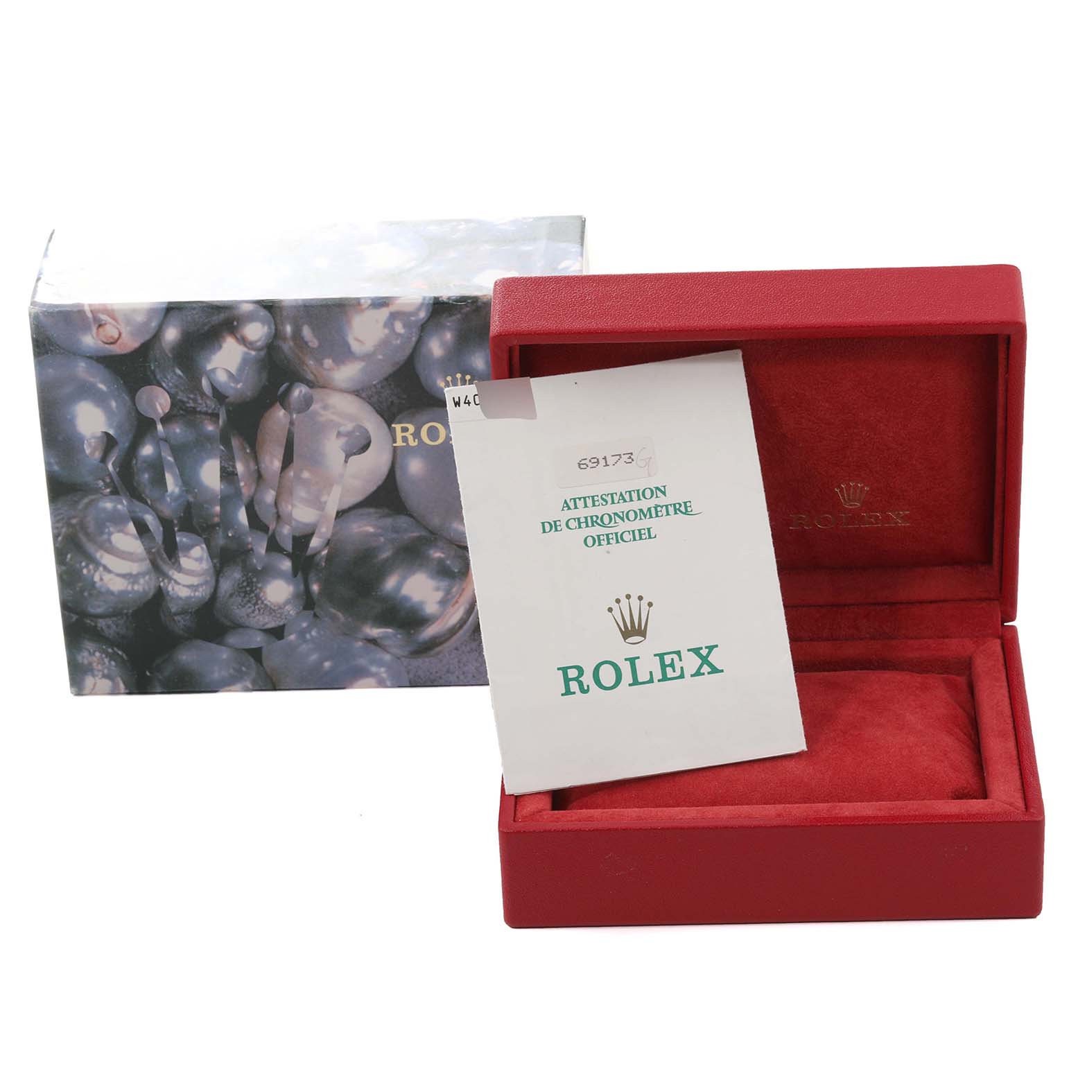 This image shows the packaging and certificate for the Rolex Datejust 69173 Women's Steel and Gold (two tone) Champagne Dial 69173 Women's Steel and Gold (two tone) Champagne Dial model, including the outer box and inner red case.