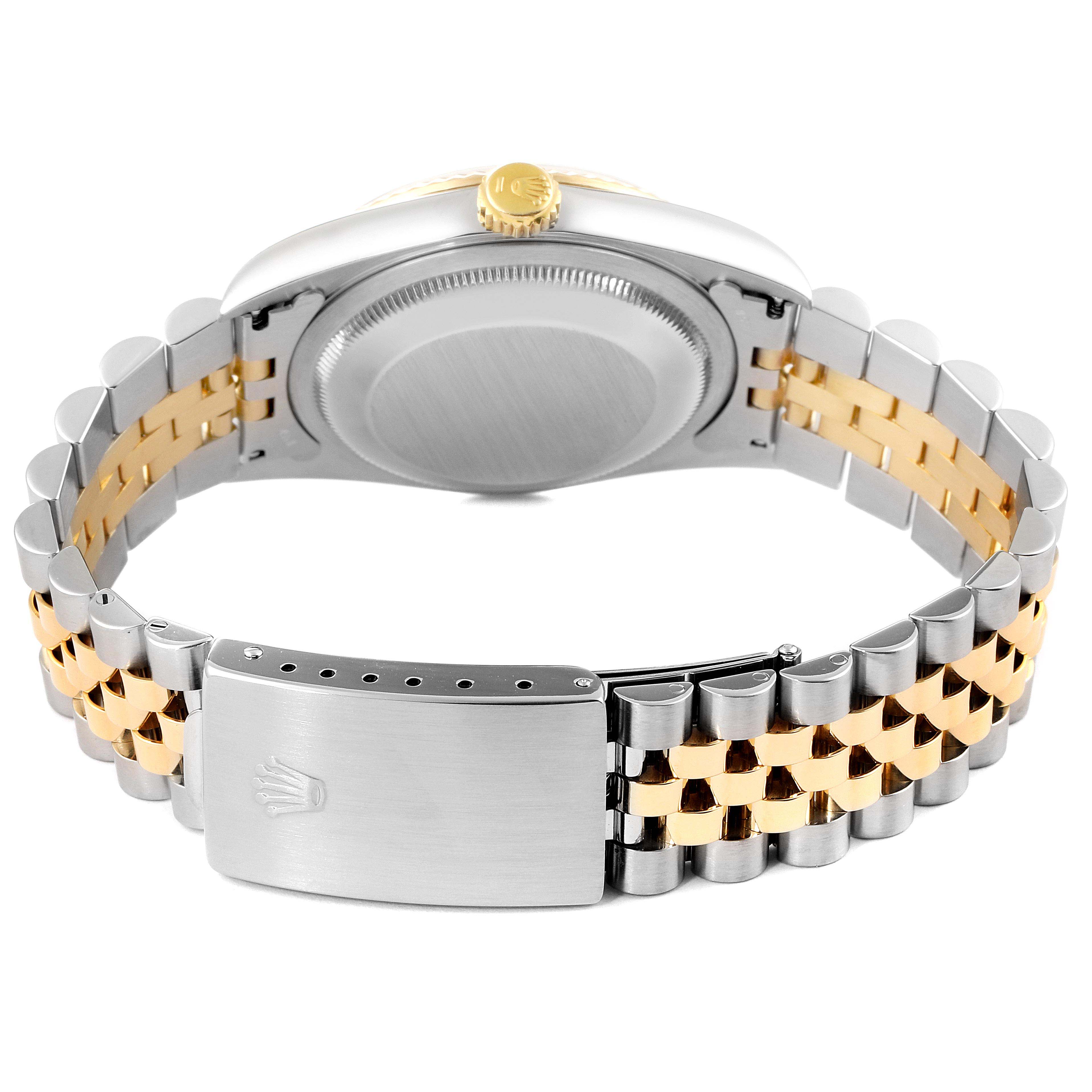 This image shows the back view of the Rolex Datejust 16233 Men's Steel and Gold (two tone) Champagne Dial 16233 Men's Steel and Gold (two tone) Champagne Dial watch, highlighting the case back, crown, and two-tone bracelet with a clasp.