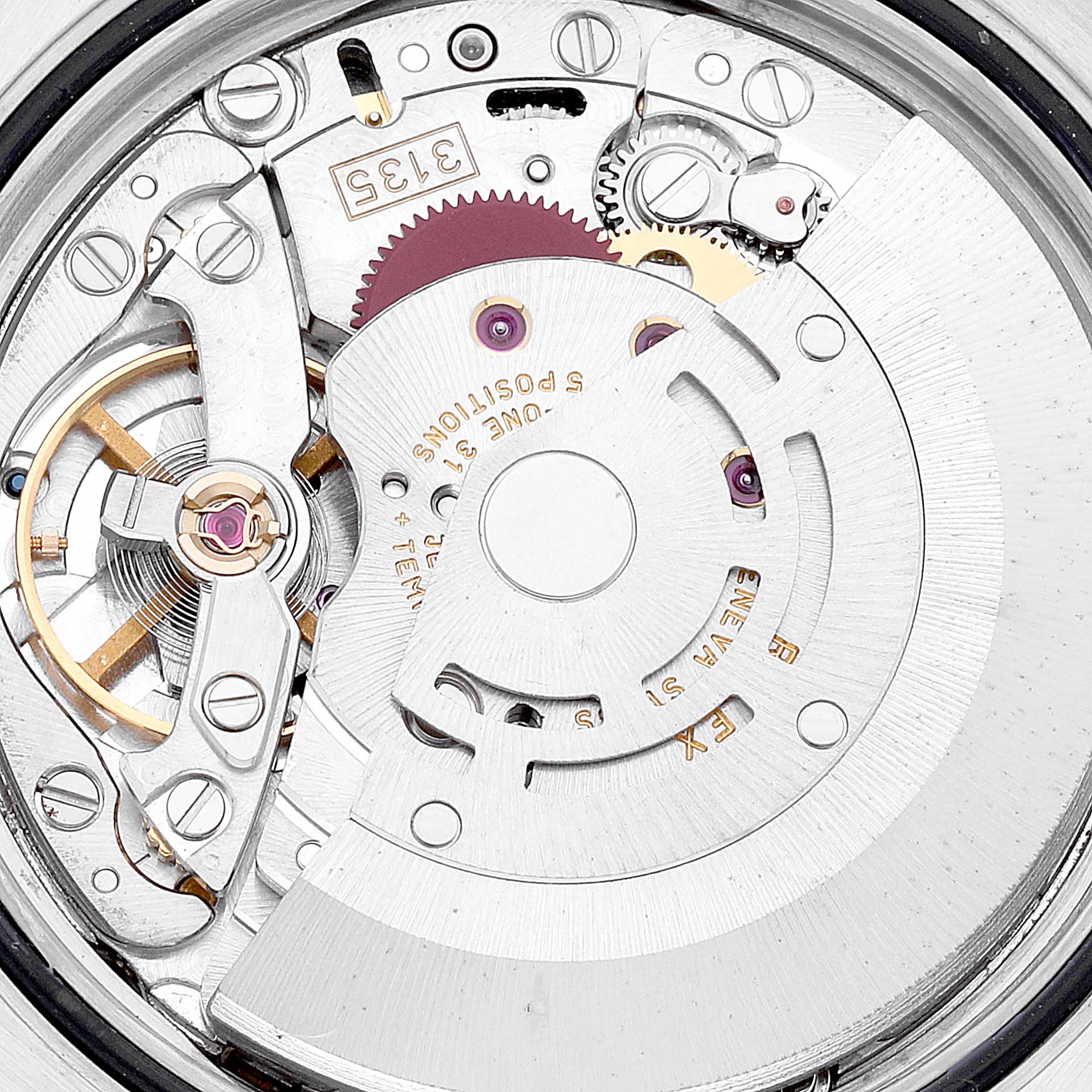 This image shows a close-up view of the movement mechanism of a Rolex Datejust 116233 Men's Steel and Gold (two tone) Mother of Pearl Dial 116233 Men's Steel and Gold (two tone) Mother of Pearl Dial watch, highlighting its intricate components and gears.