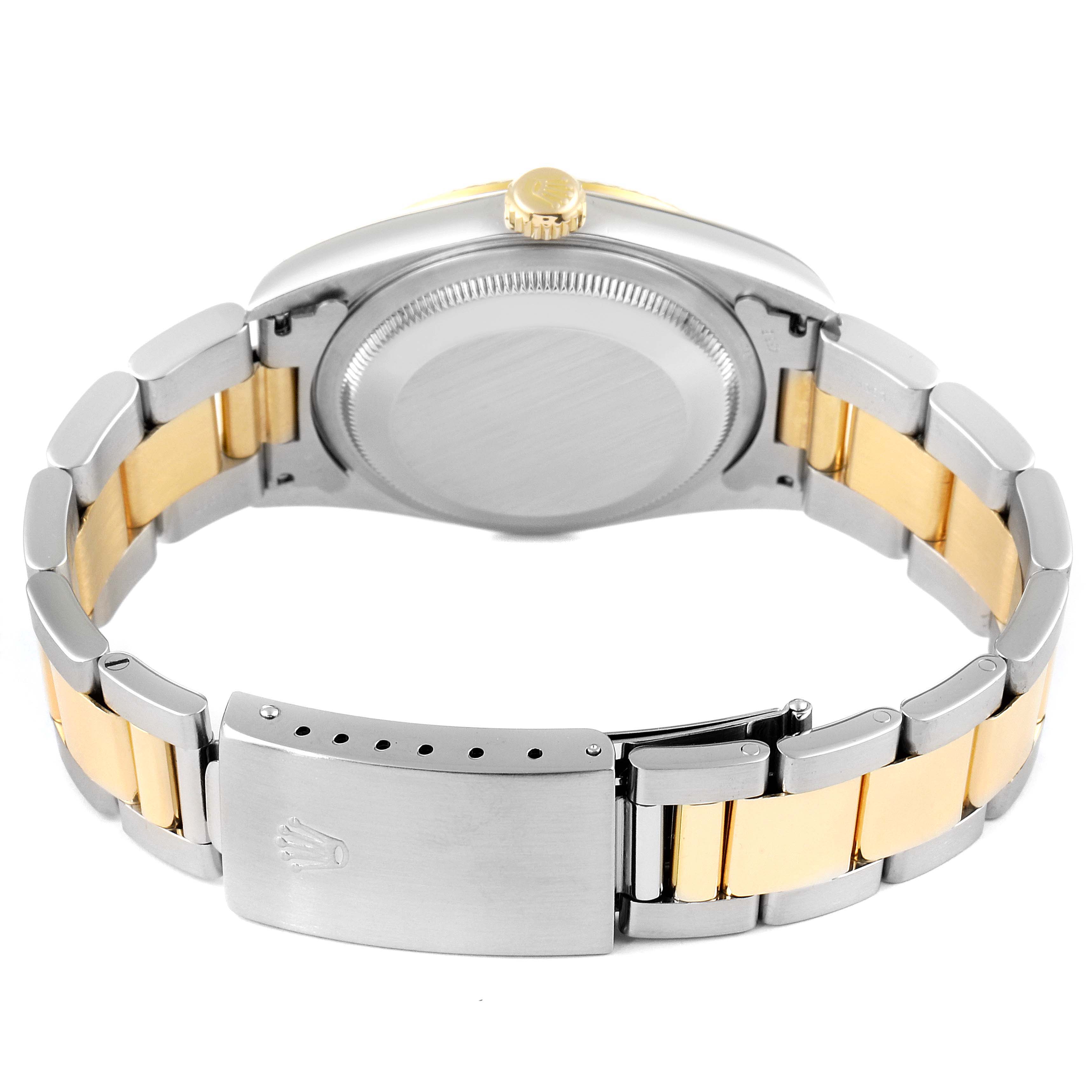 This image shows the back view of a Rolex Datejust 16233 Men's Steel and Gold (two tone) White Dial 16233 Men's Steel and Gold (two tone) White Dial watch, focusing on the case back and two-tone bracelet with clasp.