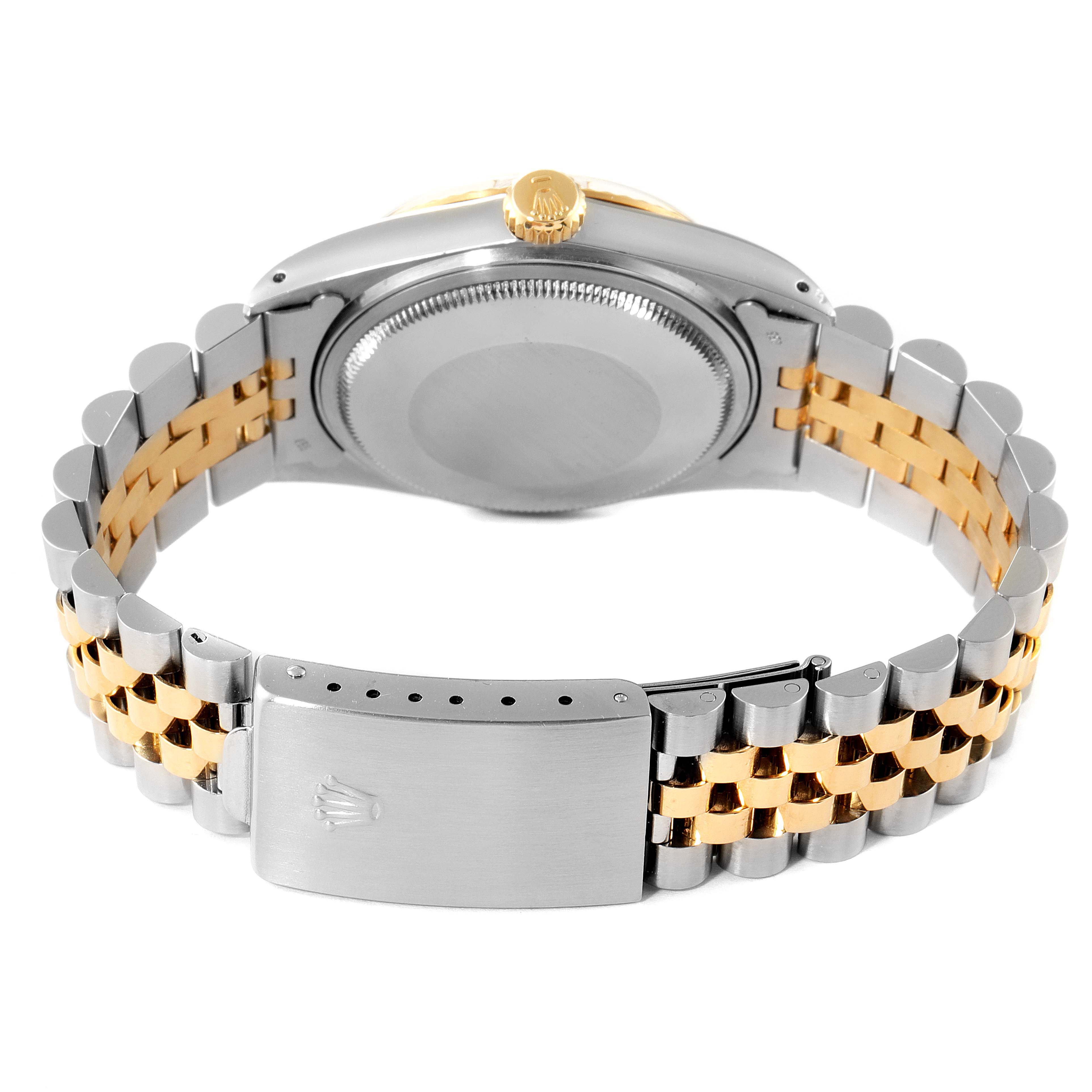 This image shows the back case and bracelet of a Rolex Vintage Collection 16013 Men's Steel and Gold (two tone) White Dial 16013 Men's Steel and Gold (two tone) White Dial watch, highlighting its two-tone metal design.