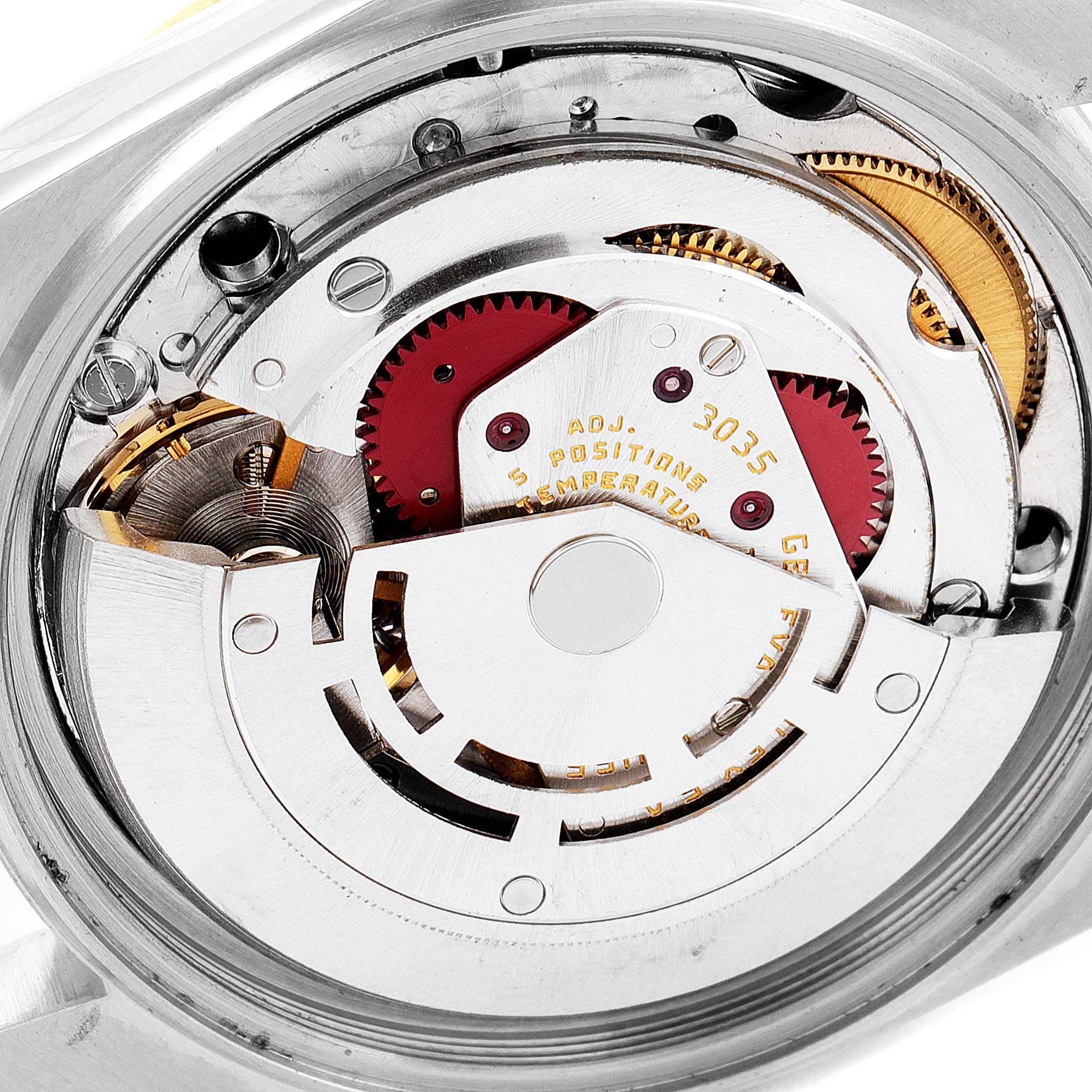This image shows a close-up of the internal movement mechanism of a Vintage Collection Rolex watch.