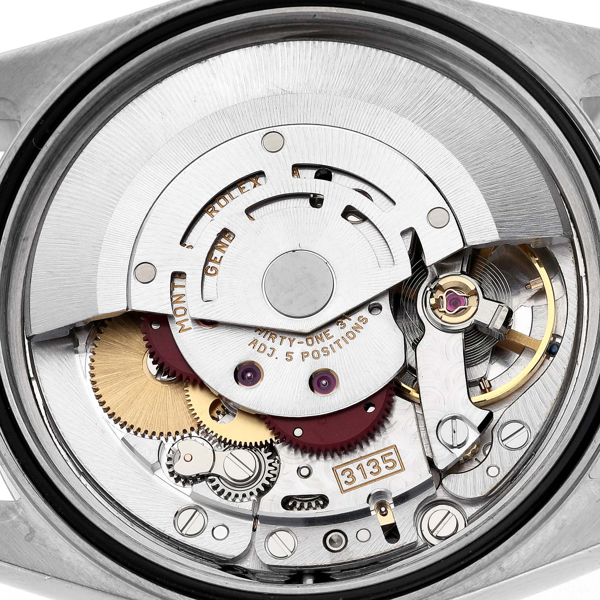 The image shows the movement of a Rolex Datejust 16233 Men's Steel and Gold (two tone) White Dial 16233 Men's Steel and Gold (two tone) White Dial, highlighting gears and internal mechanisms from the back.