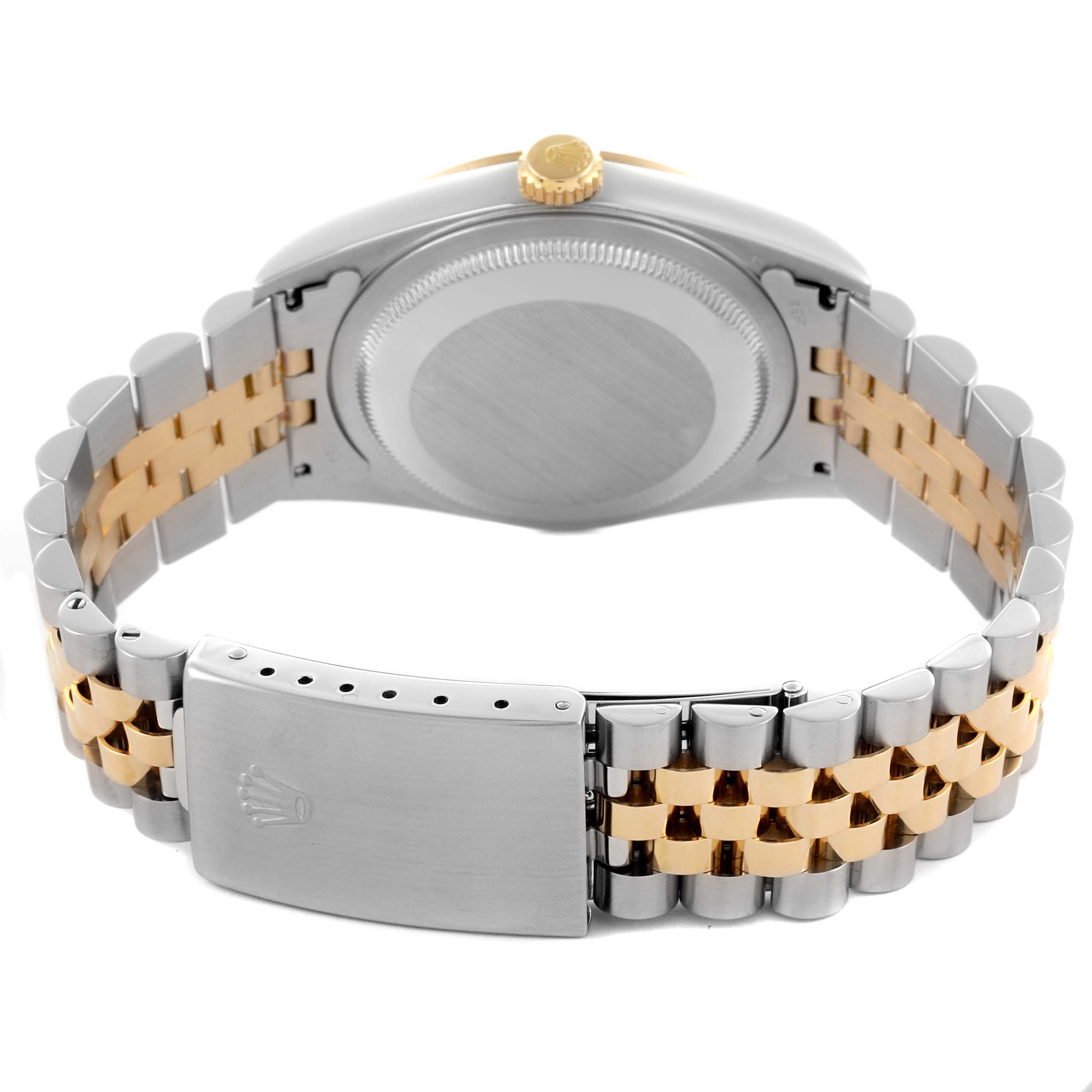 The image shows the back case and clasp of a Rolex Datejust 16233 Men's Steel and Gold (two tone) White Dial 16233 Men's Steel and Gold (two tone) White Dial, highlighting its two-tone bracelet.