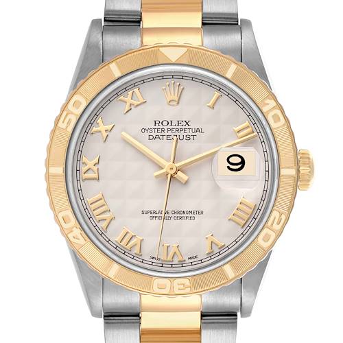 The Rolex Turn-o-Graph watch is shown from a top-down angle, highlighting the face, bezel, and part of the bracelet.