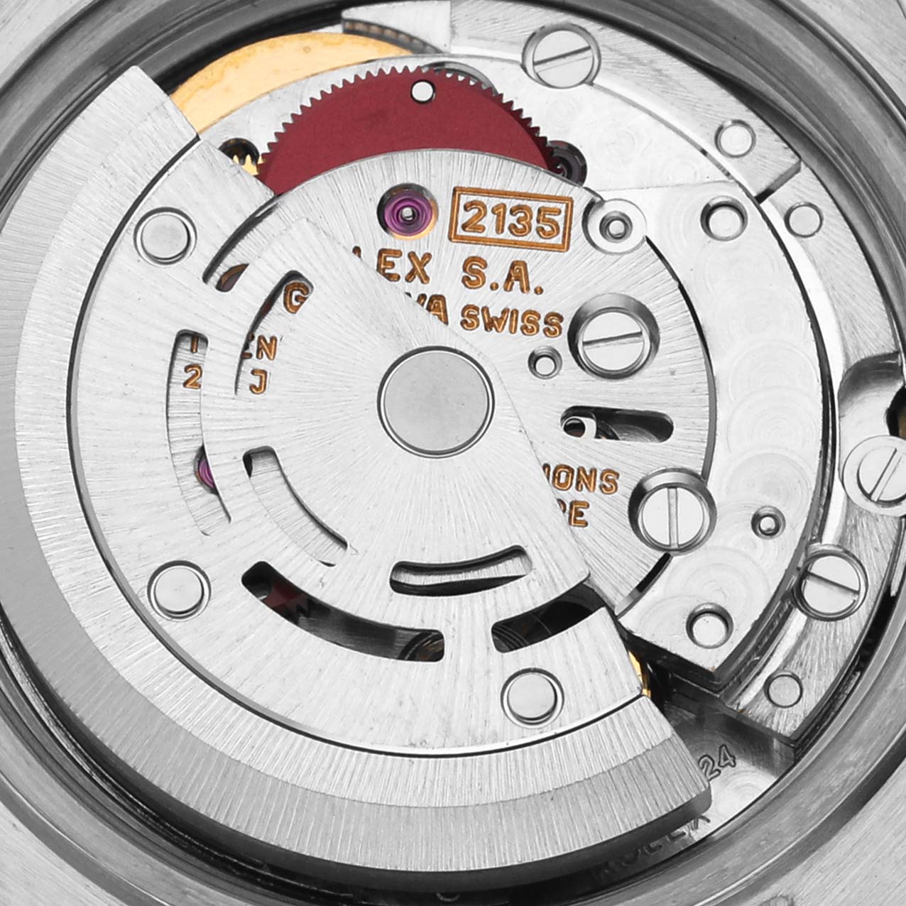 The image shows a close-up of the Rolex Datejust 69173 Women's Steel and Gold (two tone) White Dial 69173 Women's Steel and Gold (two tone) White Dial's movement, focusing on the rotor and other internal components.