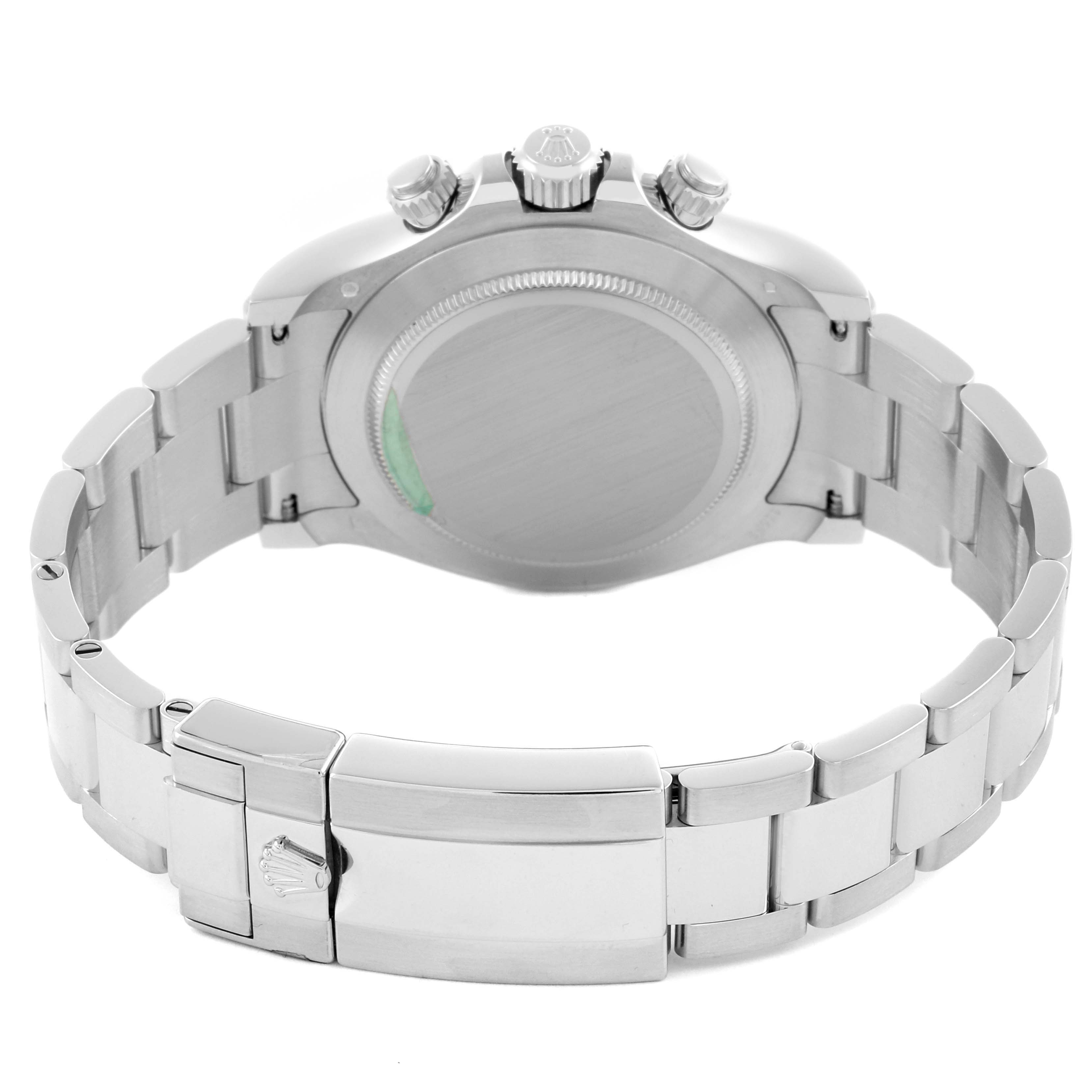 The image shows the back and bracelet of a Rolex Daytona 116506 Men's Platinum Blue Dial 116506 Men's Platinum Blue Dial watch at an angle from behind.