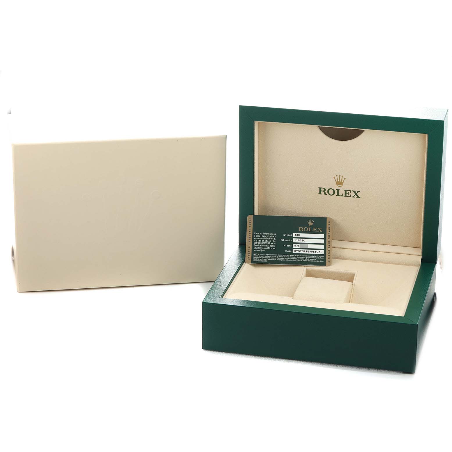 The image shows the open box and guarantee card for a Rolex Daytona 116520 Men's Stainless Steel Black Dial watch, viewed from the front.