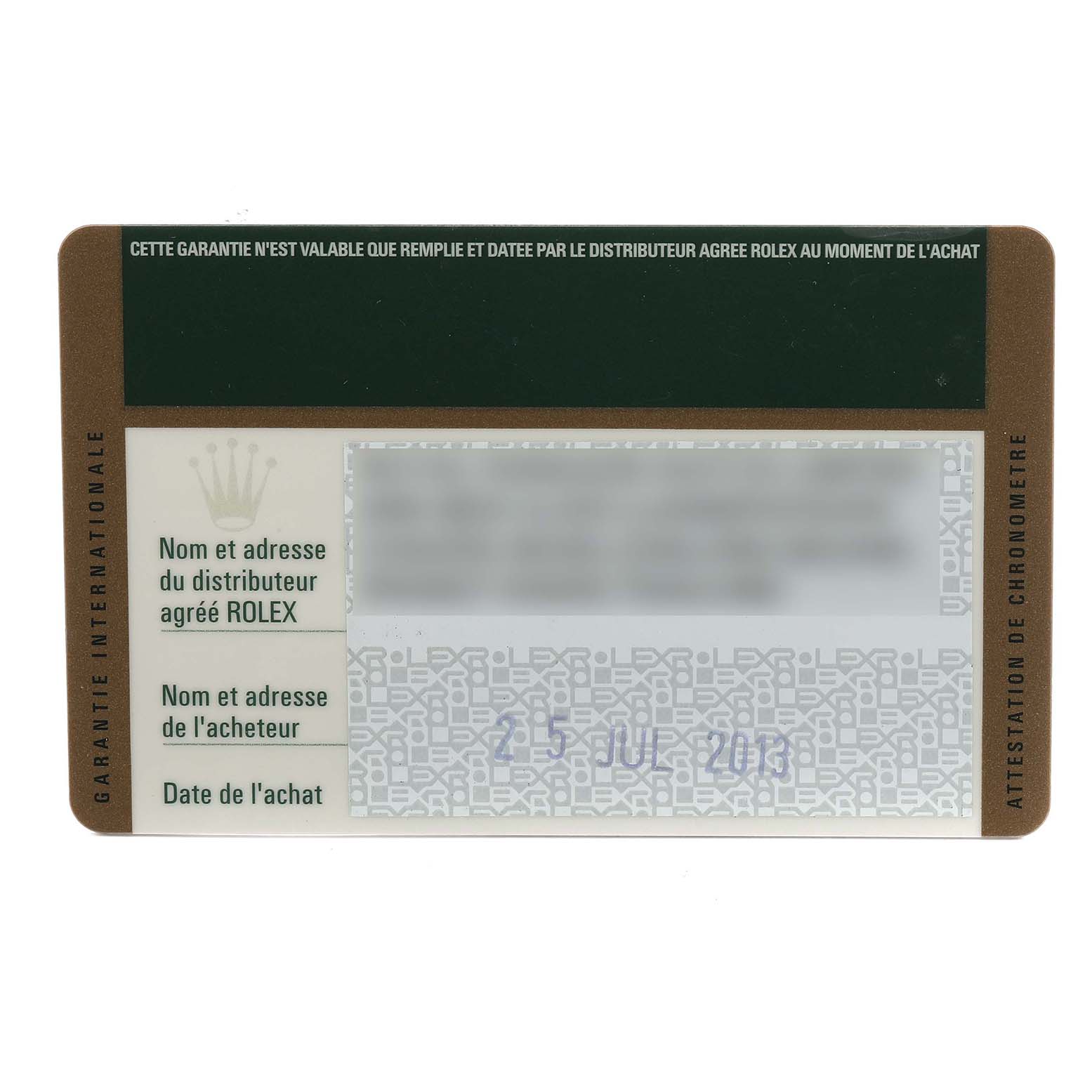 The image shows a warranty card for the Rolex Daytona 116520 Men's Stainless Steel Black Dial, viewed from above.