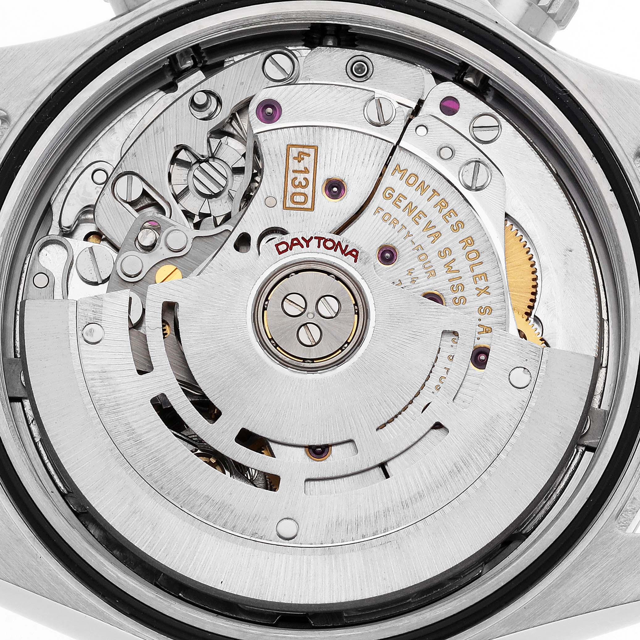 The image shows the movement of a Rolex Daytona 116520 Men's Stainless Steel Black Dial, highlighting the rotor and intricate mechanical components from a top-down angle.