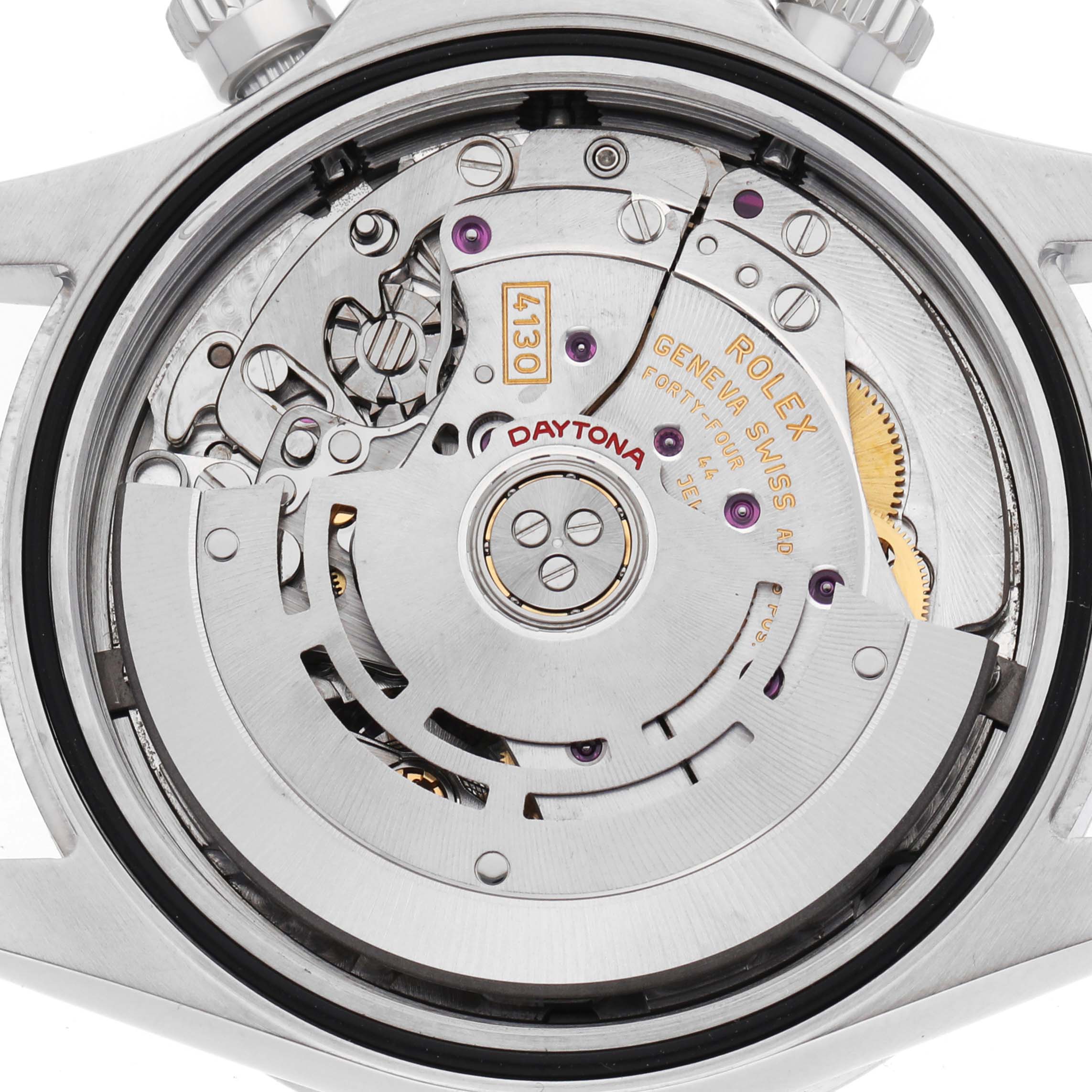 The image shows the movement and inner workings of a Rolex Daytona 116520 Men's Stainless Steel White Dial watch from a back angle.