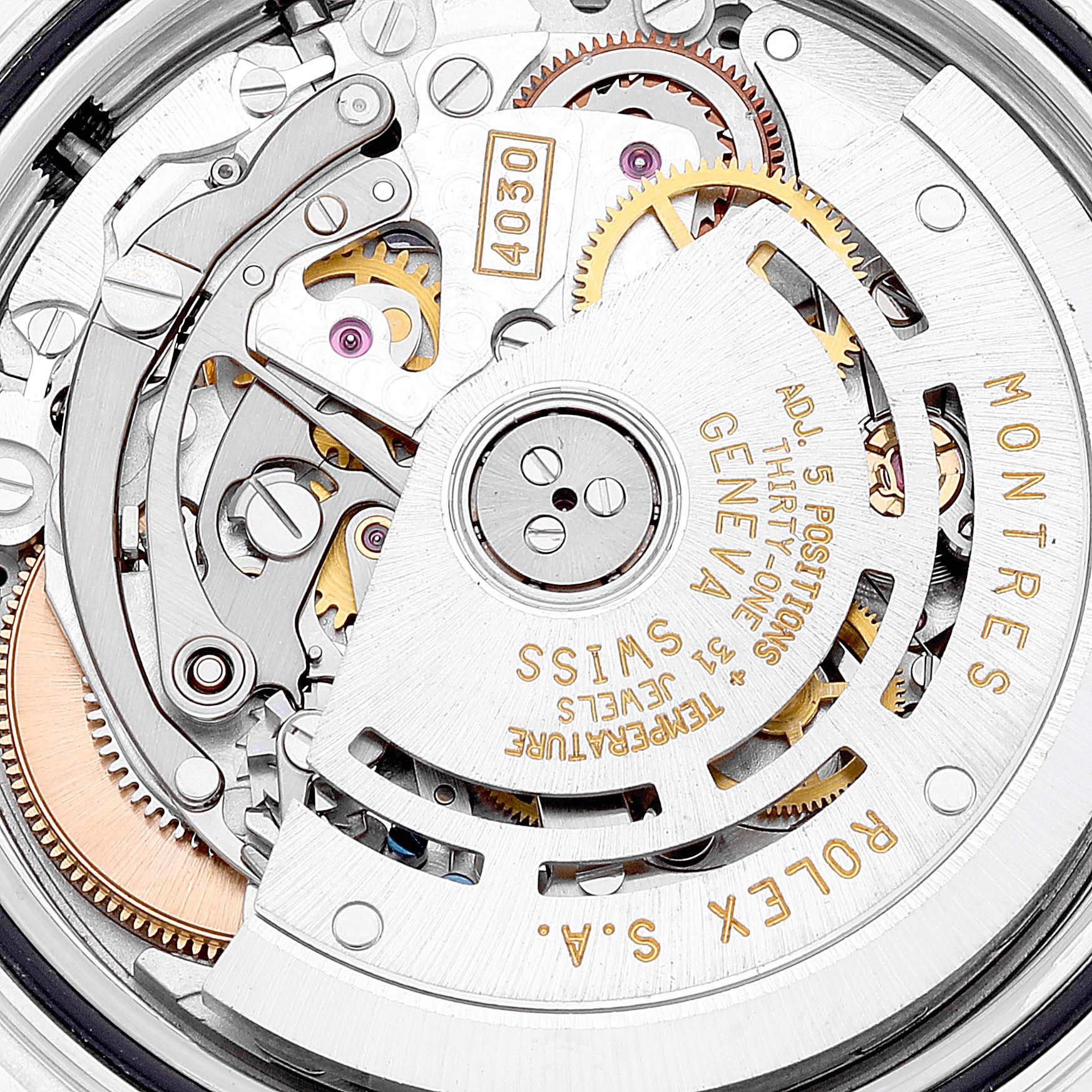 This image shows a close-up view of the intricate movement and internal mechanisms of the Rolex Daytona 16523 Men
s Steel and Gold (two tone) White Dial 16523 Men
s Steel and Gold (two tone) White Dial watch.