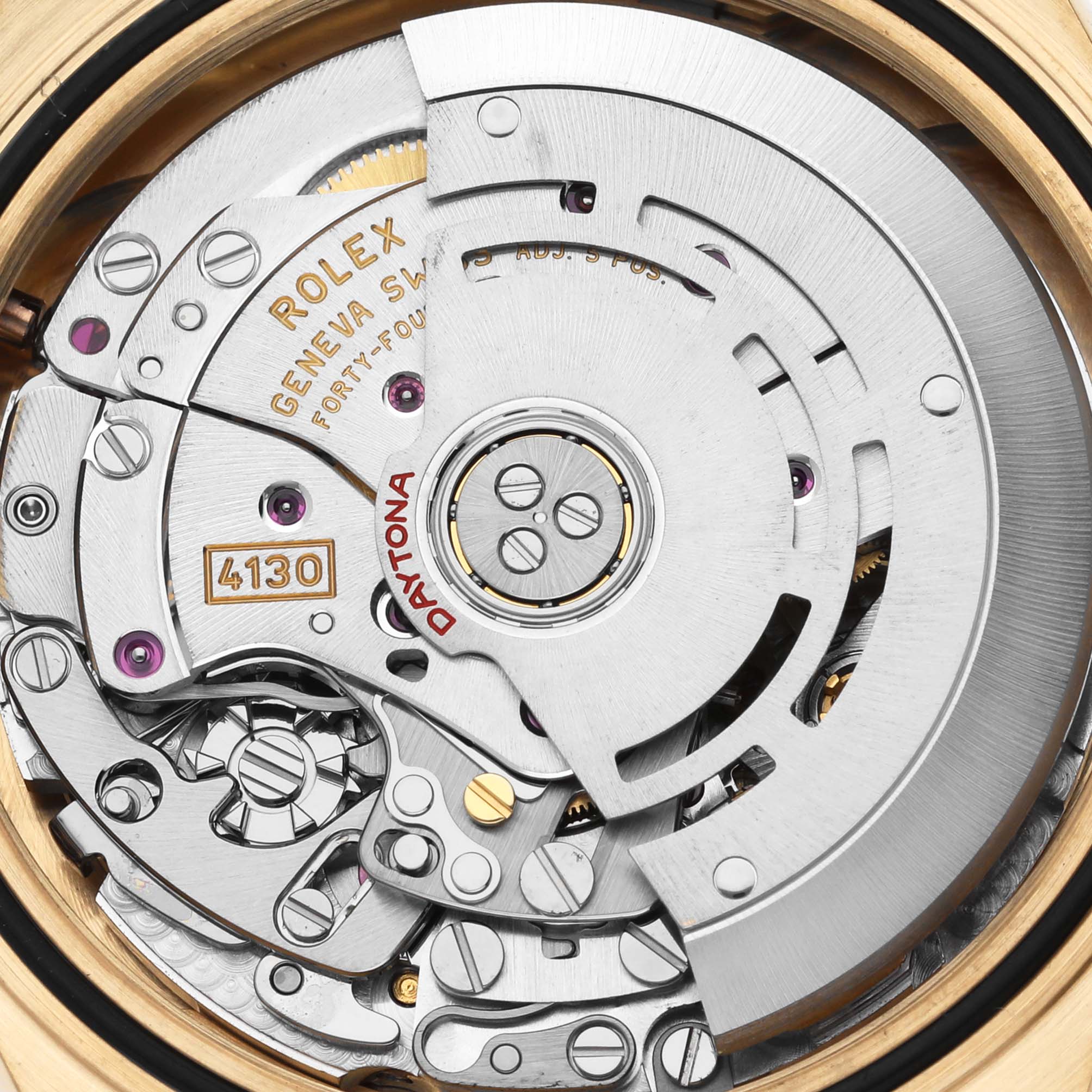 The image shows a close-up of the movement mechanism of a Rolex Daytona 116518LN Men's Yellow Gold Mother of Pearl Dial 116518LN Men's Yellow Gold Mother of Pearl Dial watch, model 4130.