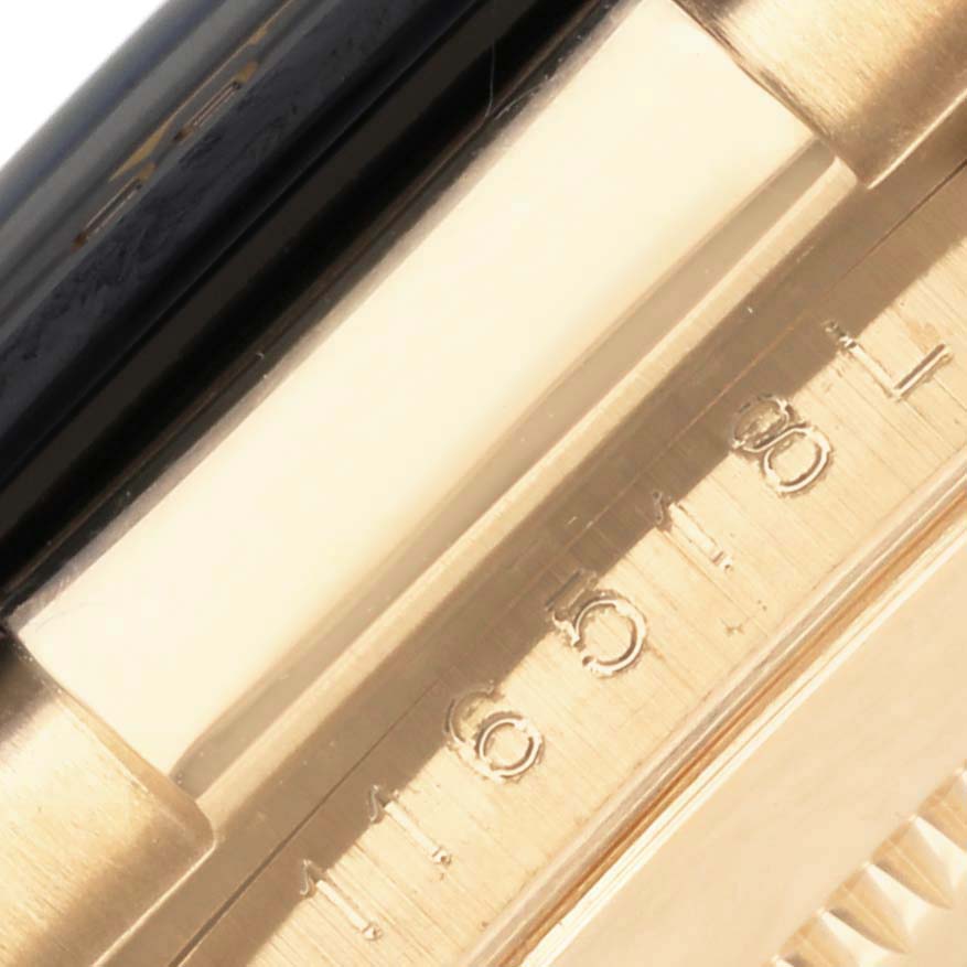 The image shows a side view of a Rolex Daytona 116518LN Men's Yellow Gold Mother of Pearl Dial 116518LN Men's Yellow Gold Mother of Pearl Dial watch, focusing on the bezel and part of the case.