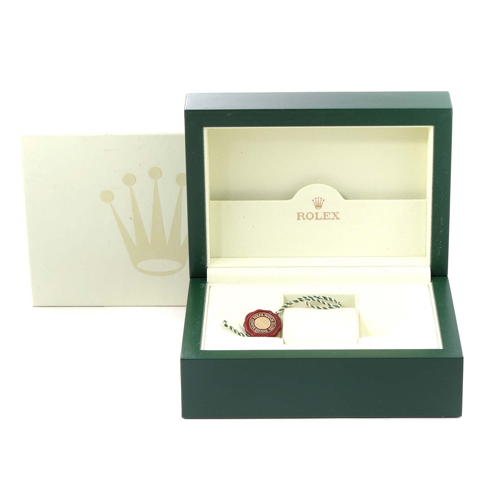 The image shows the open box for a Rolex Explorer 16570 Men's Stainless Steel Black Dial 16570 Men's Stainless Steel Black Dial watch with a tag and cushion inside, viewed from the front.