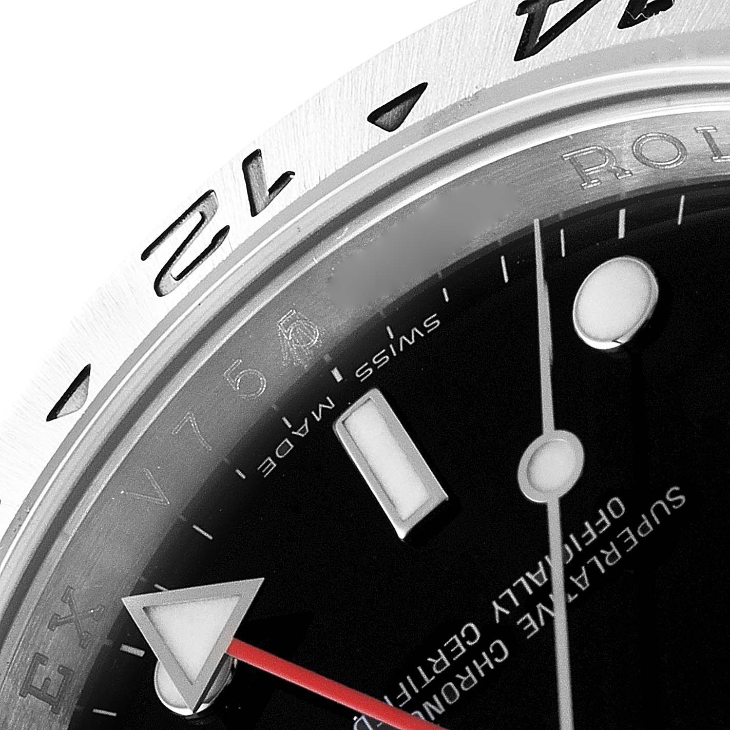 The image shows a close-up of the dial and bezel of a Rolex Explorer 16570 Men's Stainless Steel Black Dial 16570 Men's Stainless Steel Black Dial watch, highlighting the hour markers and text details.