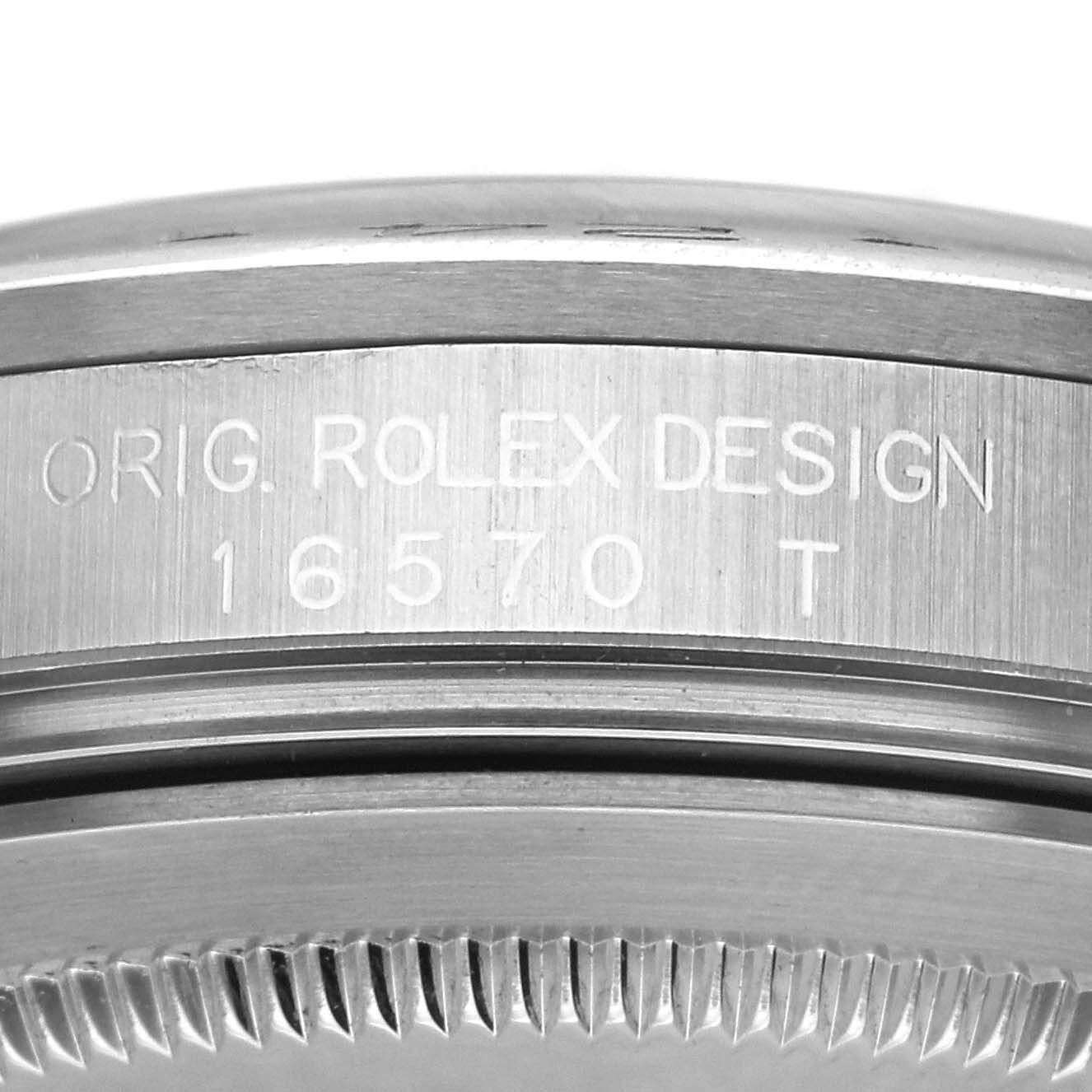 The image shows a close-up of the side of a Rolex Explorer 16570T Men
s Stainless Steel Black Dial 16570T Men
s Stainless Steel Black Dial watch case, highlighting the engraved model details.
