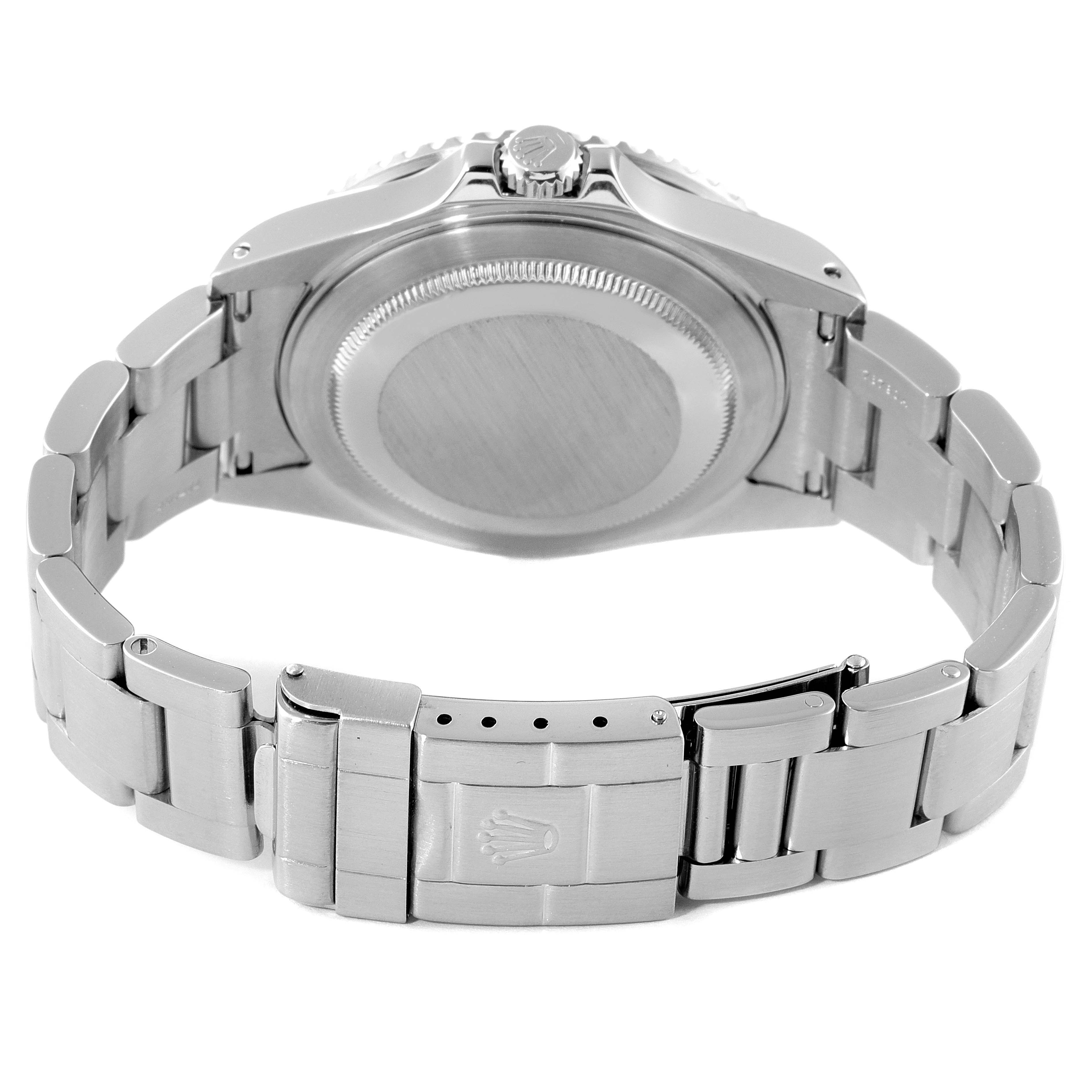 This image shows the back case and bracelet clasp of a Rolex GMT-Master 16710 Men
s Stainless Steel Black Dial 16710 Men
s Stainless Steel Black Dial watch from a rear angle view.