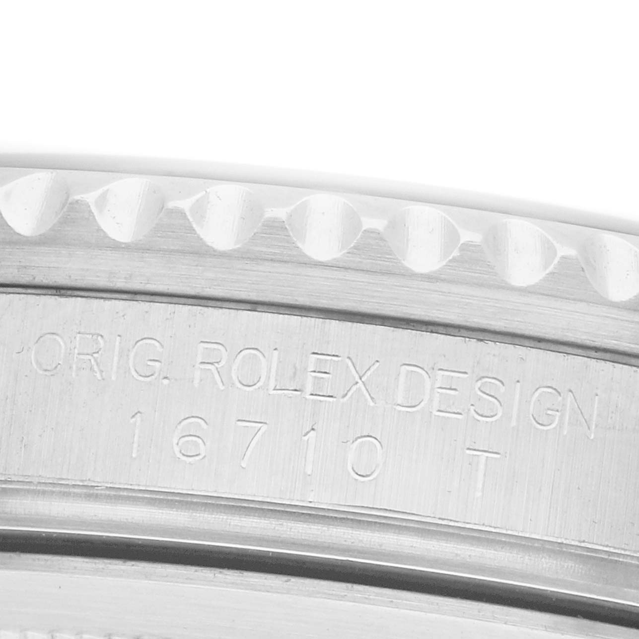 The image shows a side view of the case engraving on a Rolex GMT-Master 16710 Men's Stainless Steel Black Dial, focusing on the model number 16710T.
