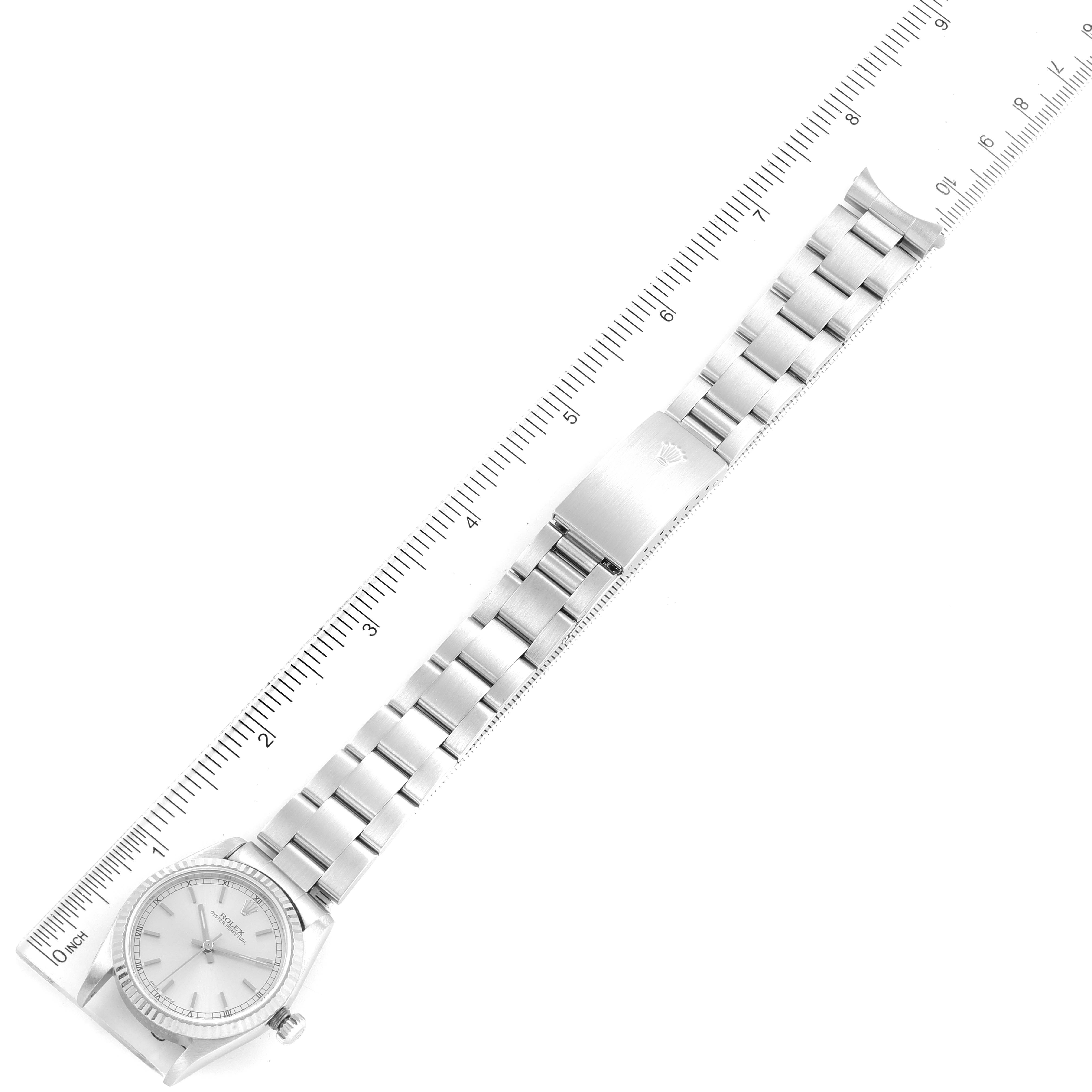 The image shows a top-down view of a Mid-Size Rolex watch with its bracelet, measuring approximately 9 inches.