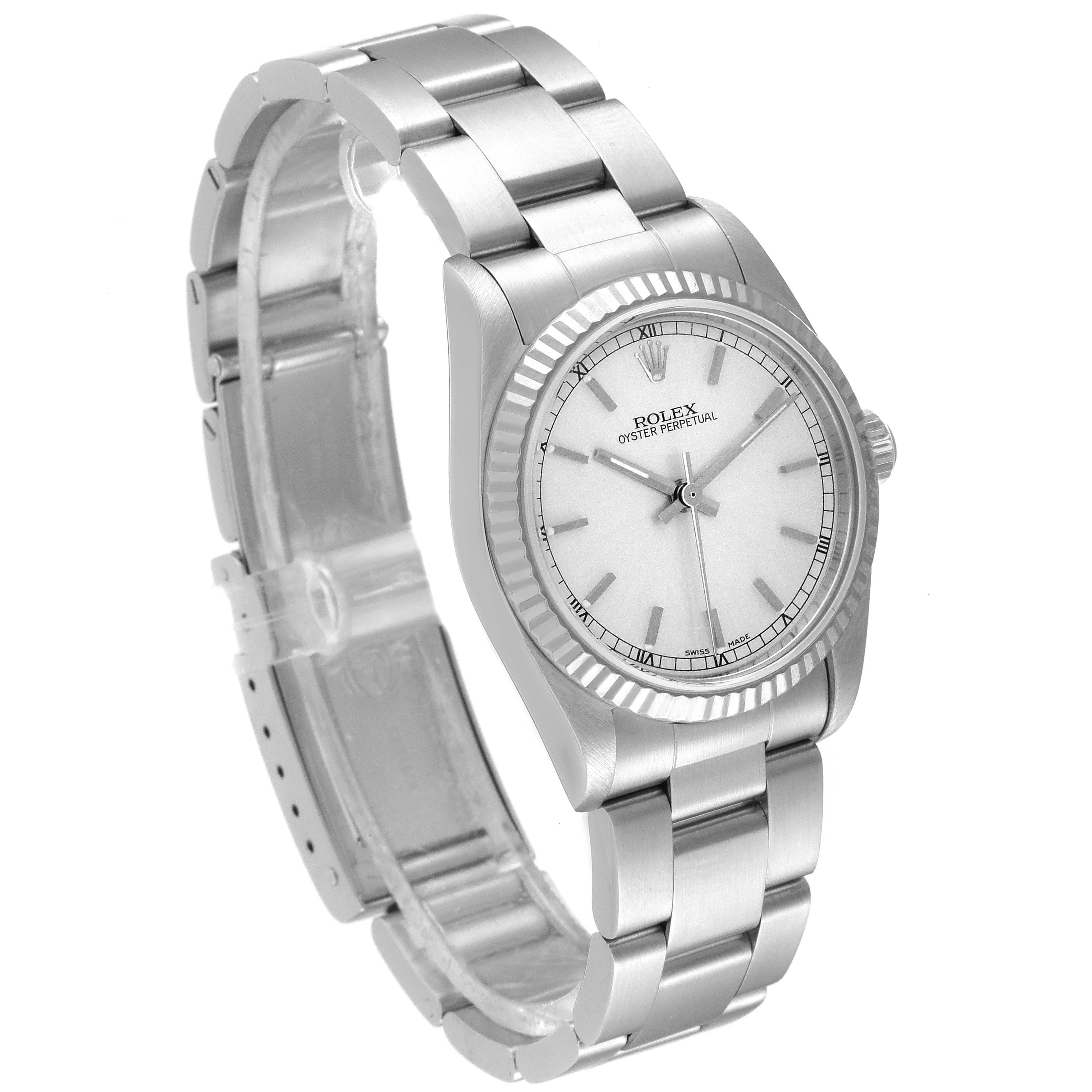 The image shows a Mid-Size Rolex Oyster Perpetual watch at a slight angle, displaying the dial, bezel, and bracelet.