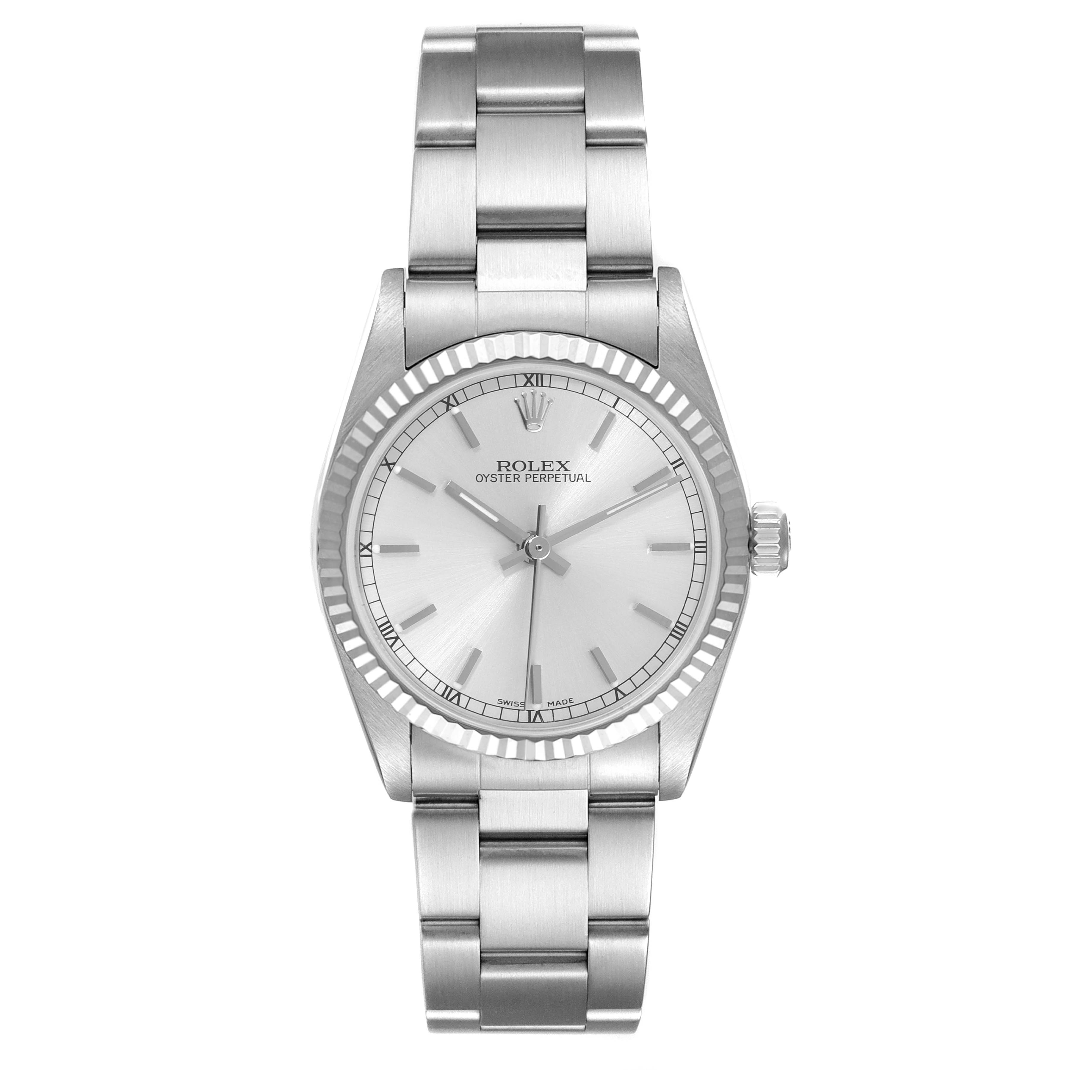 The image shows a front view of a Rolex Mid-Size 77014 Women
s Stainless Steel Silver Dial 77014 Women
s Stainless Steel Silver Dial Oyster Perpetual watch, highlighting its face and bracelet.