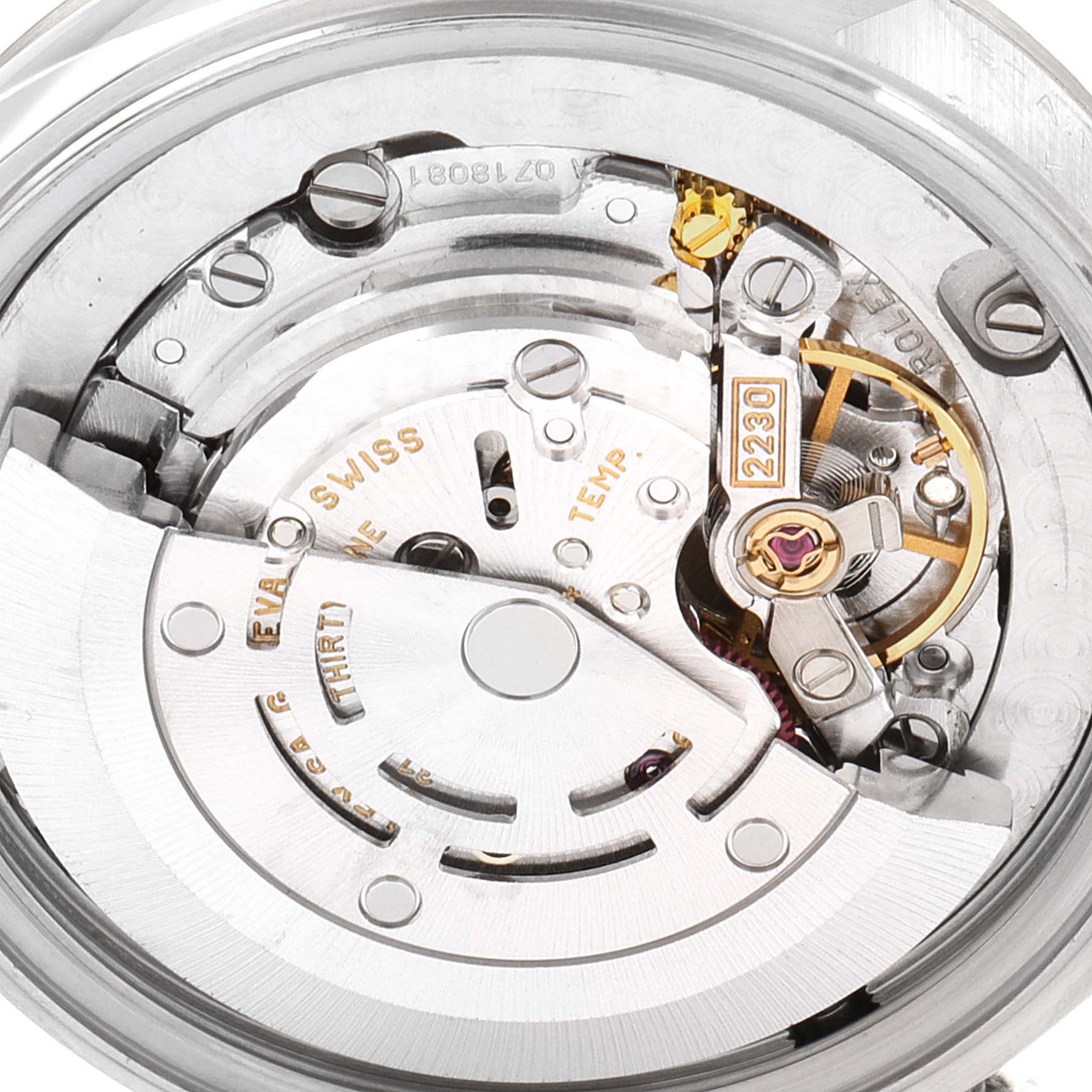 This close-up image shows the internal mechanical movement of a Rolex Mid-Size 77014 Women
s Stainless Steel Silver Dial 77014 Women
s Stainless Steel Silver Dial model watch.