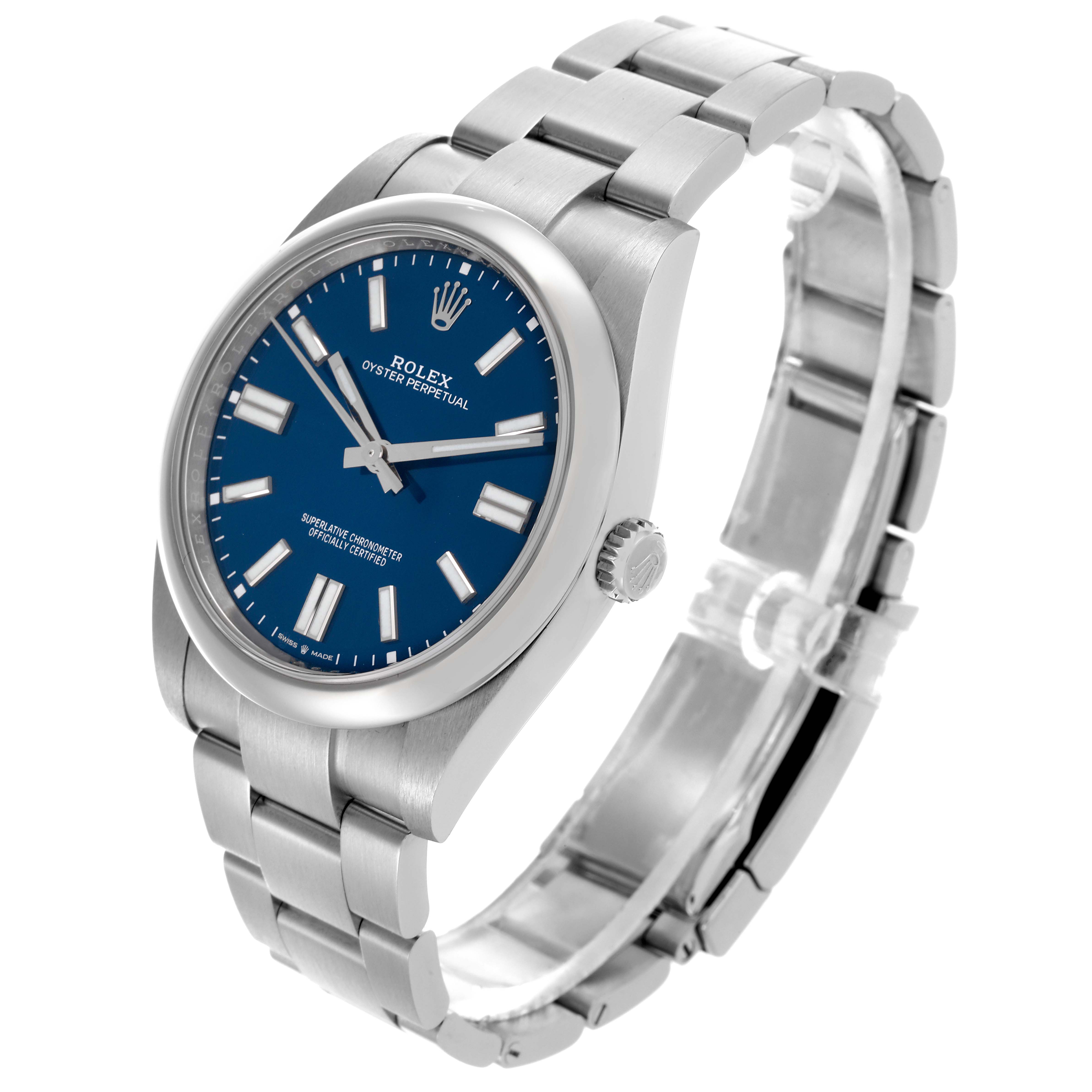 The Rolex Oyster Perpetual 124300 Men's Stainless Steel Blue Dial 124300 Men's Stainless Steel Blue Dial watch is shown at a three-quarter angle, displaying the face, bezel, crown, and bracelet.