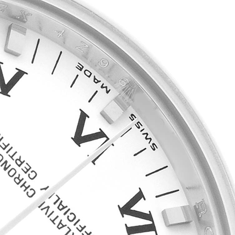 The image shows a close-up of the dial of a Rolex Mid-Size 177200 Women's Stainless Steel White Dial watch, highlighting the minute hand, Roman numeral markers, and "Swiss Made" text.