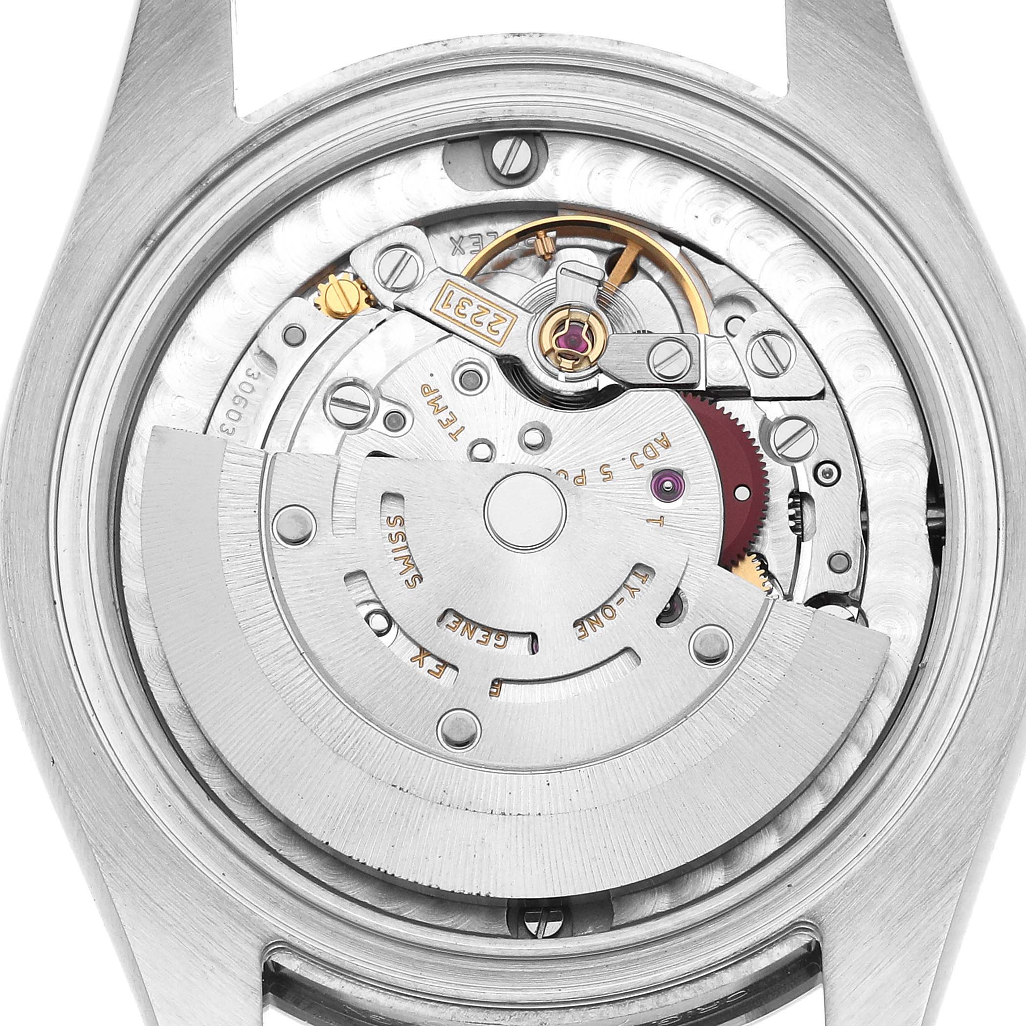 This image shows the internal mechanism of a Rolex Mid-Size 177200 Women's Stainless Steel White Dial model watch, viewed from the case back, highlighting its rotor and movement components.