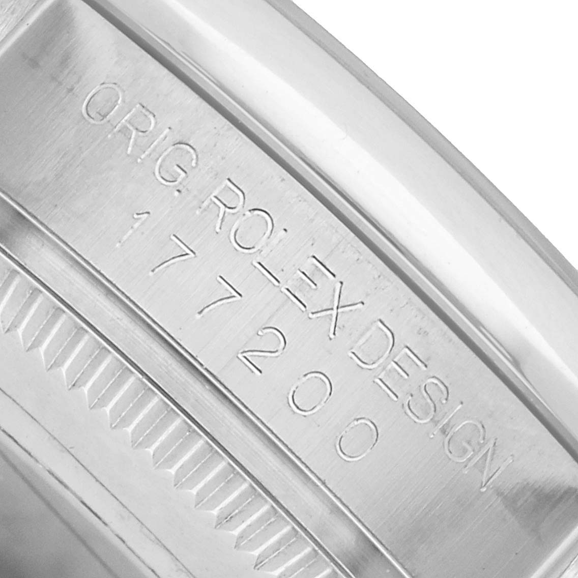 The image shows a close-up of the engraved side of the Rolex Mid-Size 177200 Women's Stainless Steel White Dial model with "ORIG. ROLEX DESIGN 177200" visible.