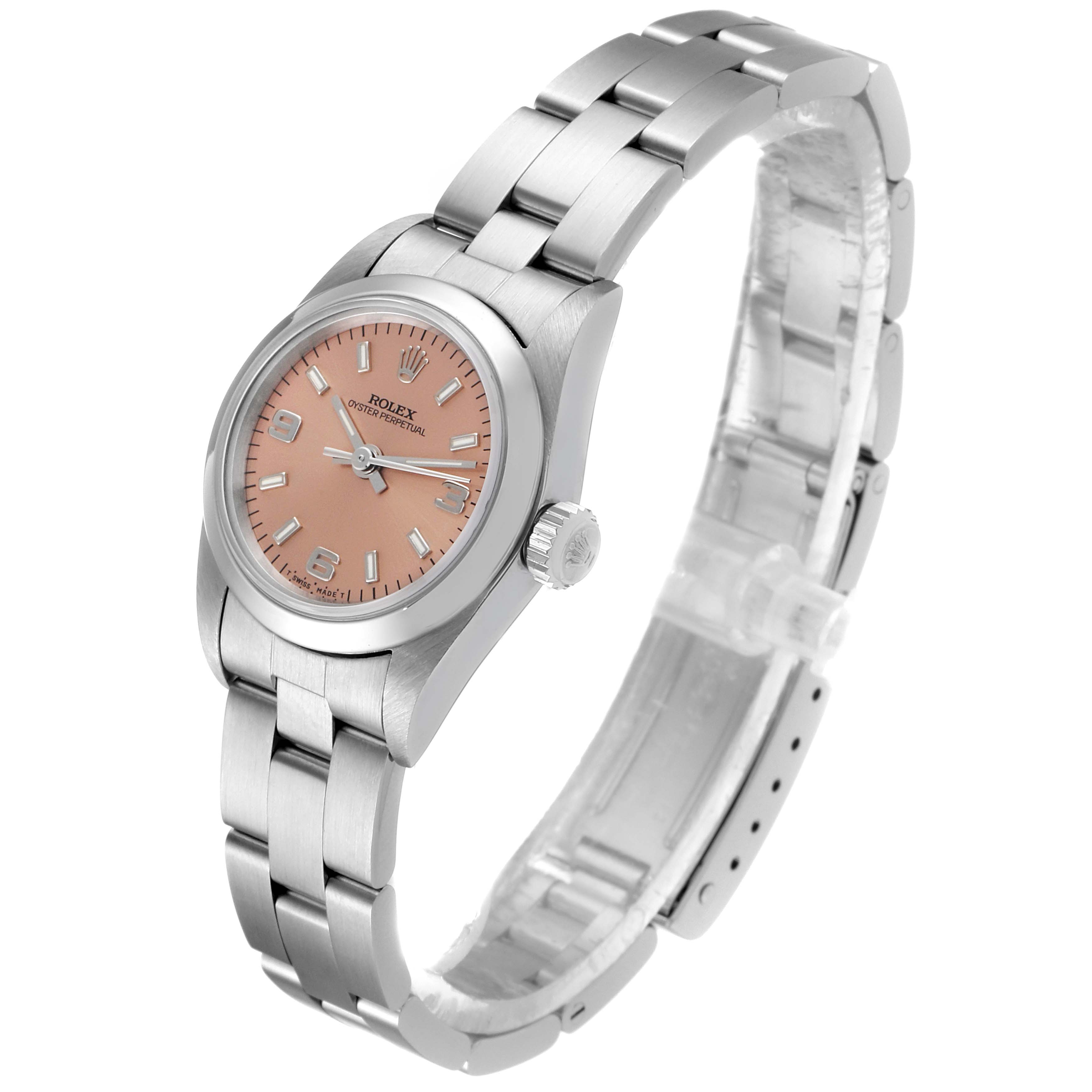 The image shows a Rolex Oyster Perpetual 67180 Women's Stainless Steel Pink Dial 67180 Women's Stainless Steel Pink Dial watch at a three-quarter angle, highlighting the watch face, case, crown, and bracelet.