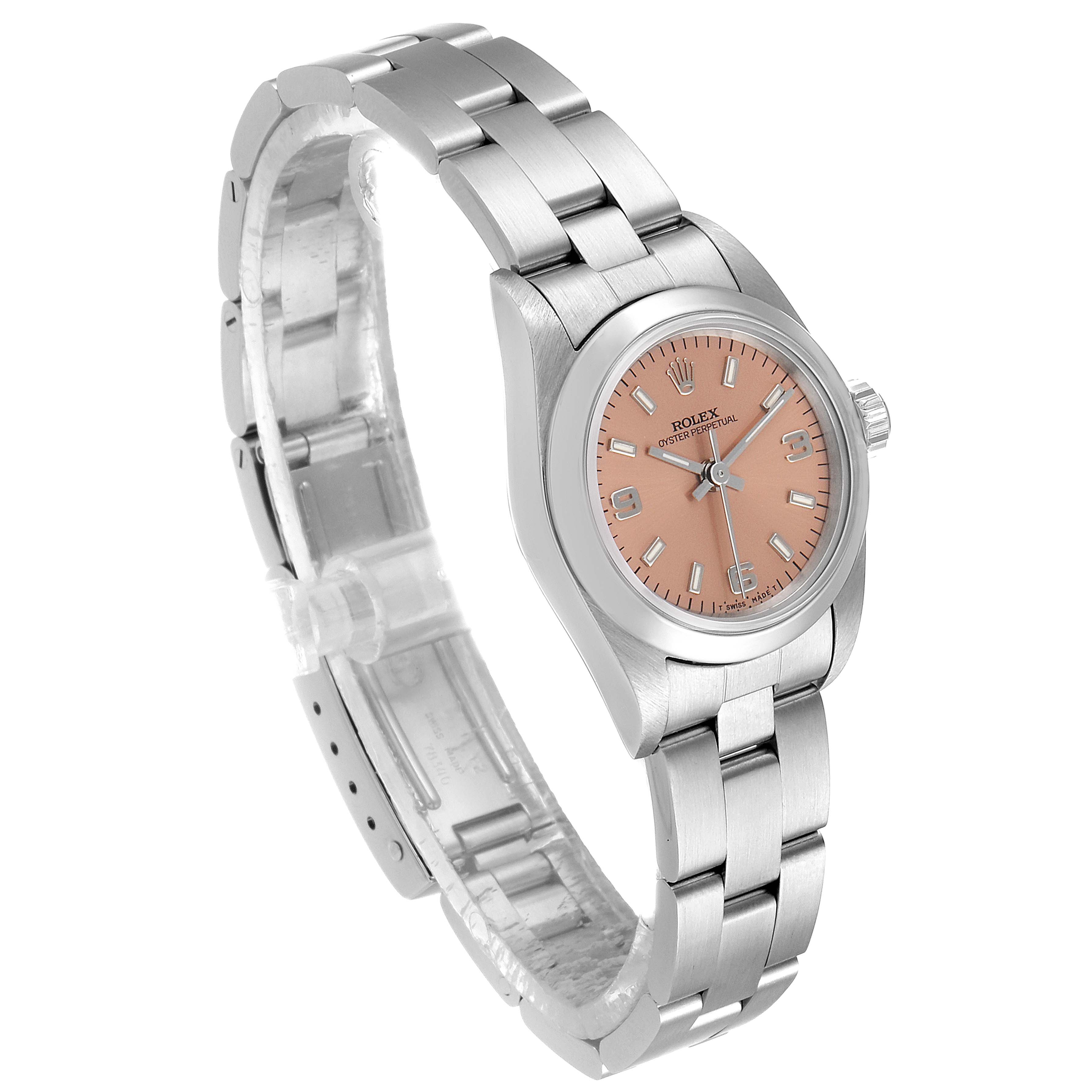 The Rolex Oyster Perpetual 67180 Women's Stainless Steel Pink Dial 67180 Women's Stainless Steel Pink Dial watch is shown at a slight angle, displaying its face, bezel, and bracelet.