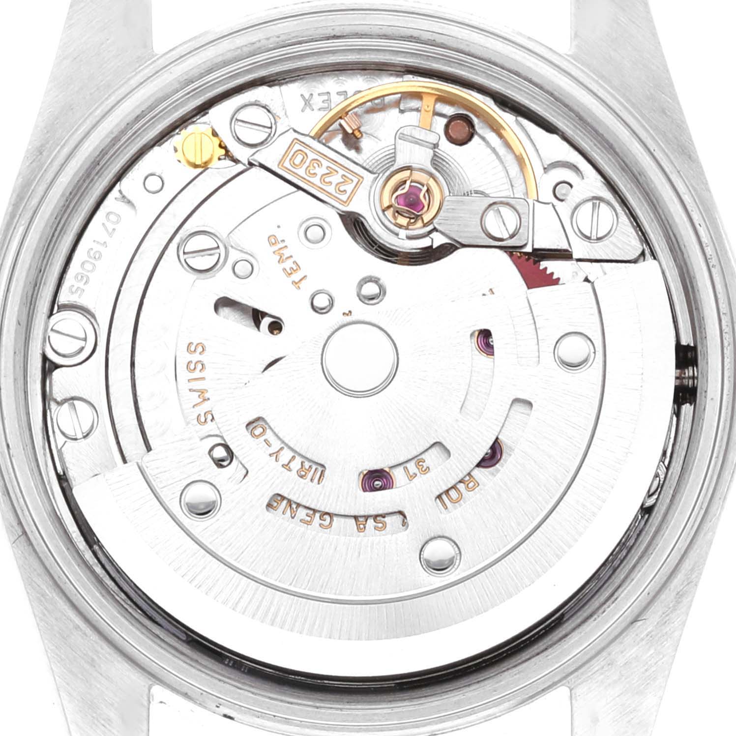 The image shows the internal mechanism of a Rolex Oyster Perpetual 76080 Women
s Stainless Steel Pink Dial 76080 Women
s Stainless Steel Pink Dial watch from a close-up, top-down angle.