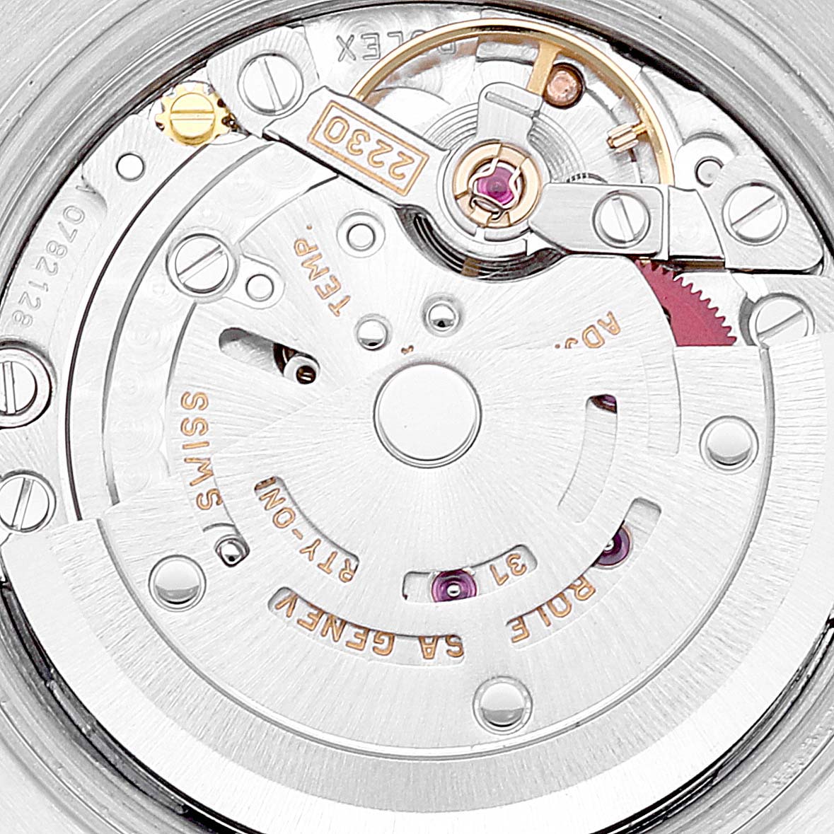 The image shows a close-up of the movement mechanism of a Rolex Oyster Perpetual 76030 Women
s Stainless Steel Pink Dial 76030 Women
s Stainless Steel Pink Dial watch.