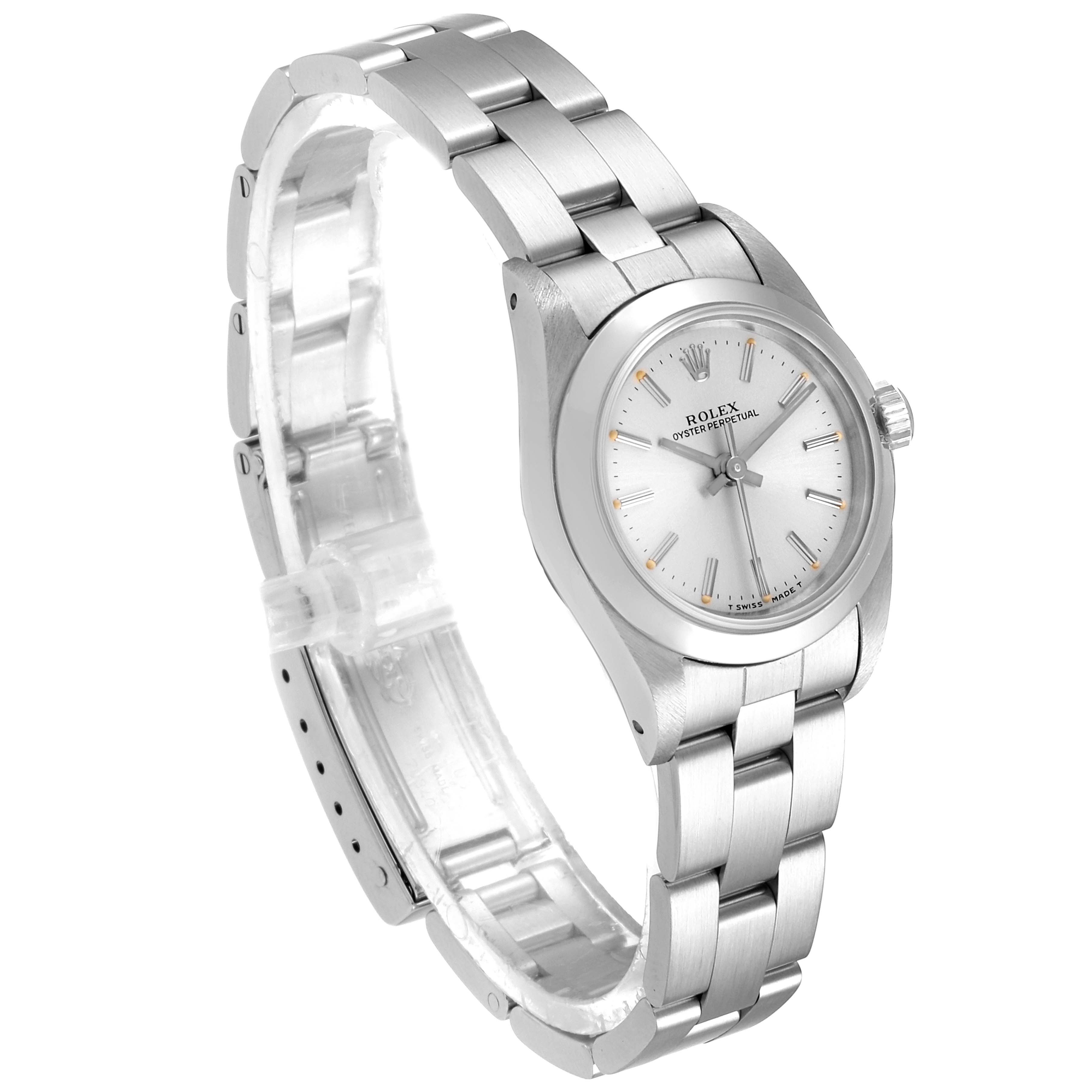 The image shows a Rolex Oyster Perpetual 67180 Women's Stainless Steel Silver Dial 67180 Women's Stainless Steel Silver Dial watch at a three-quarter angle, displaying its stainless steel bracelet and silver dial.