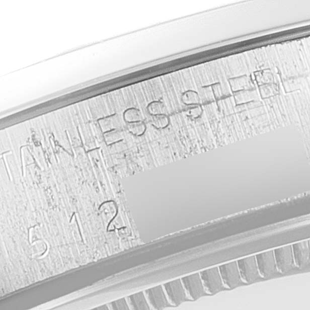 This close-up image shows the side engraving on a Vintage Collection Rolex stainless steel watch case.