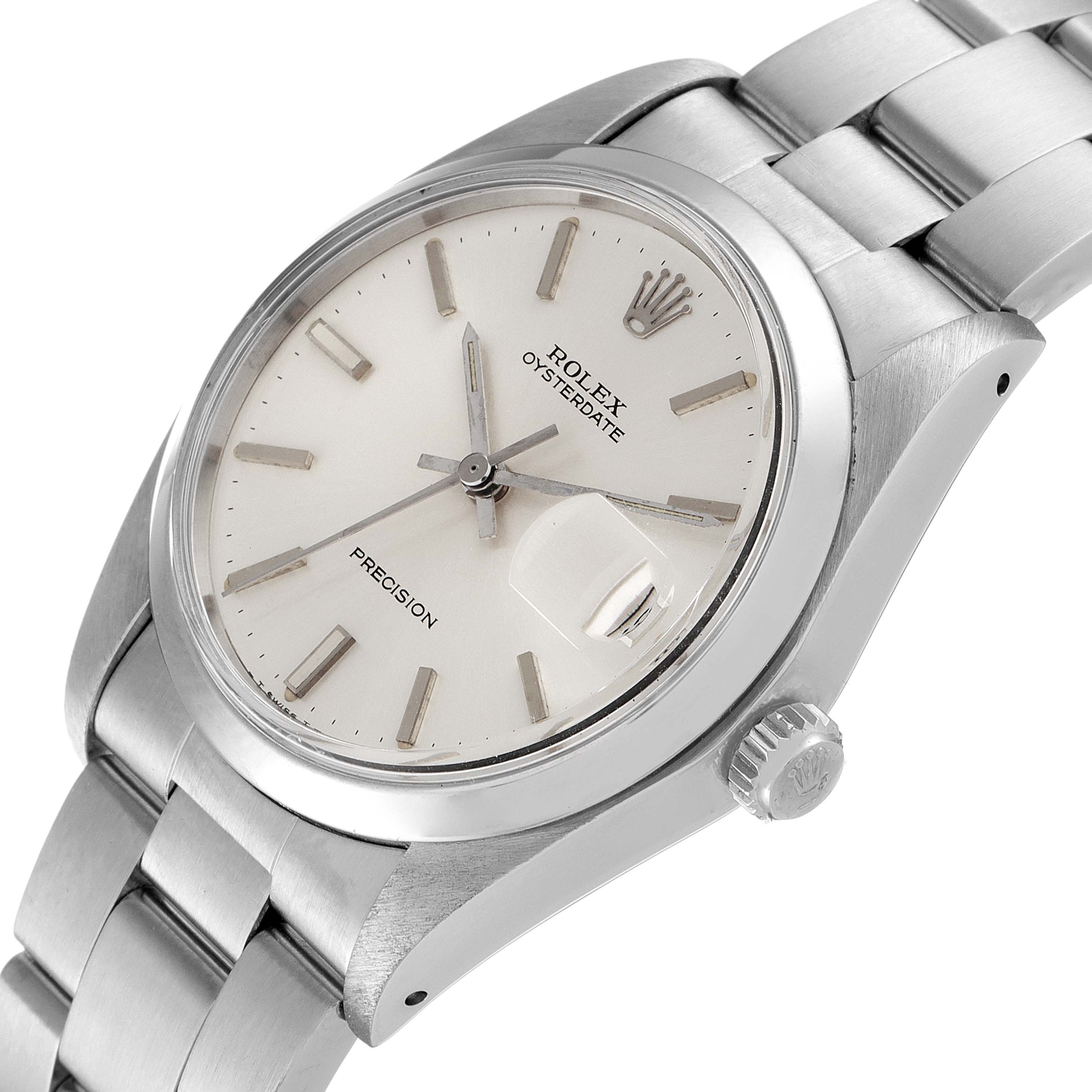 This image shows a side view of the Rolex Vintage Collection 6694 Men's Stainless Steel Silver Dial 6694 Men's Stainless Steel Silver Dial Oysterdate watch, highlighting its face, bezel, and bracelet.