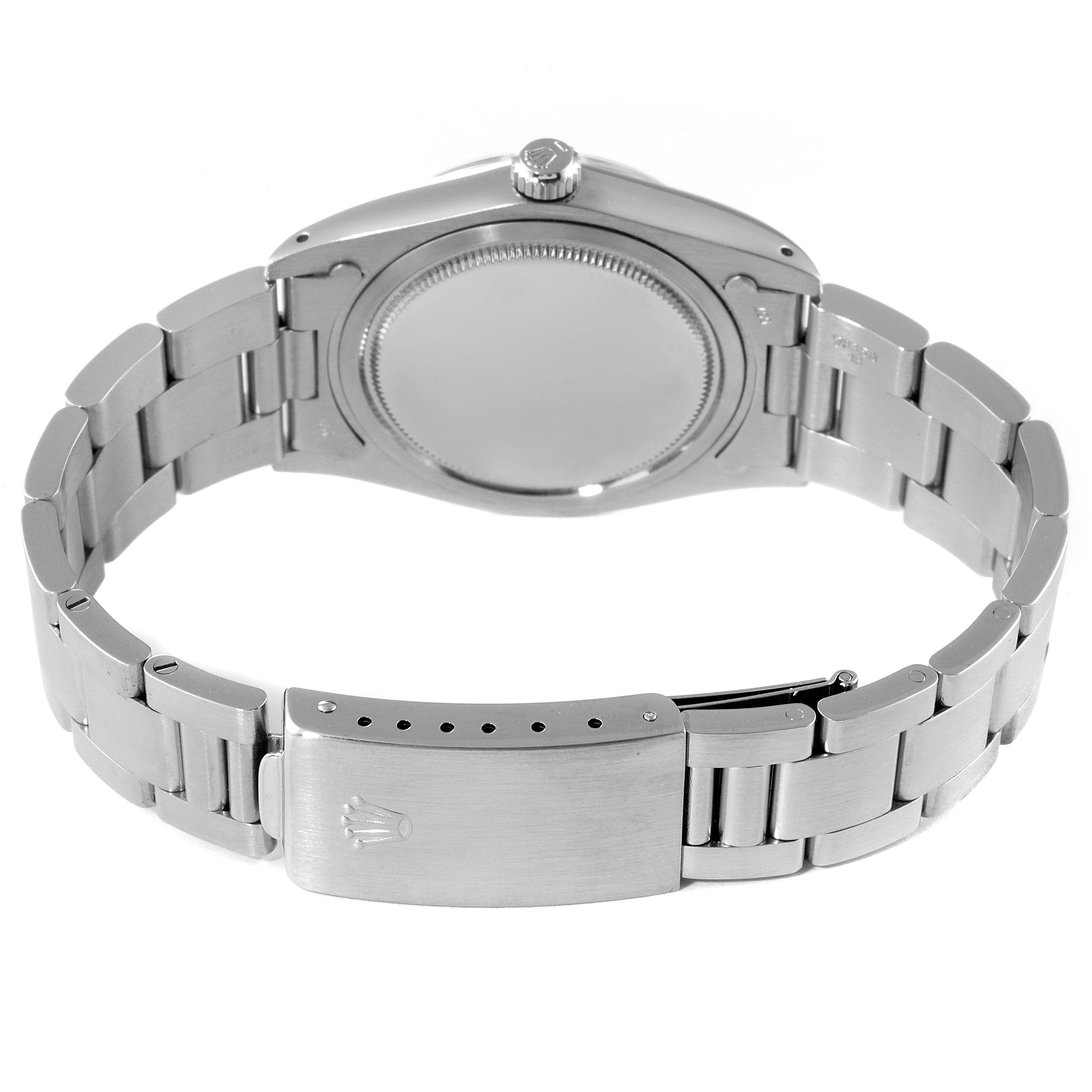 The image shows the back case and stainless steel bracelet of a Rolex Vintage Collection 6694 Men's Stainless Steel Silver Dial 6694 Men's Stainless Steel Silver Dial watch.