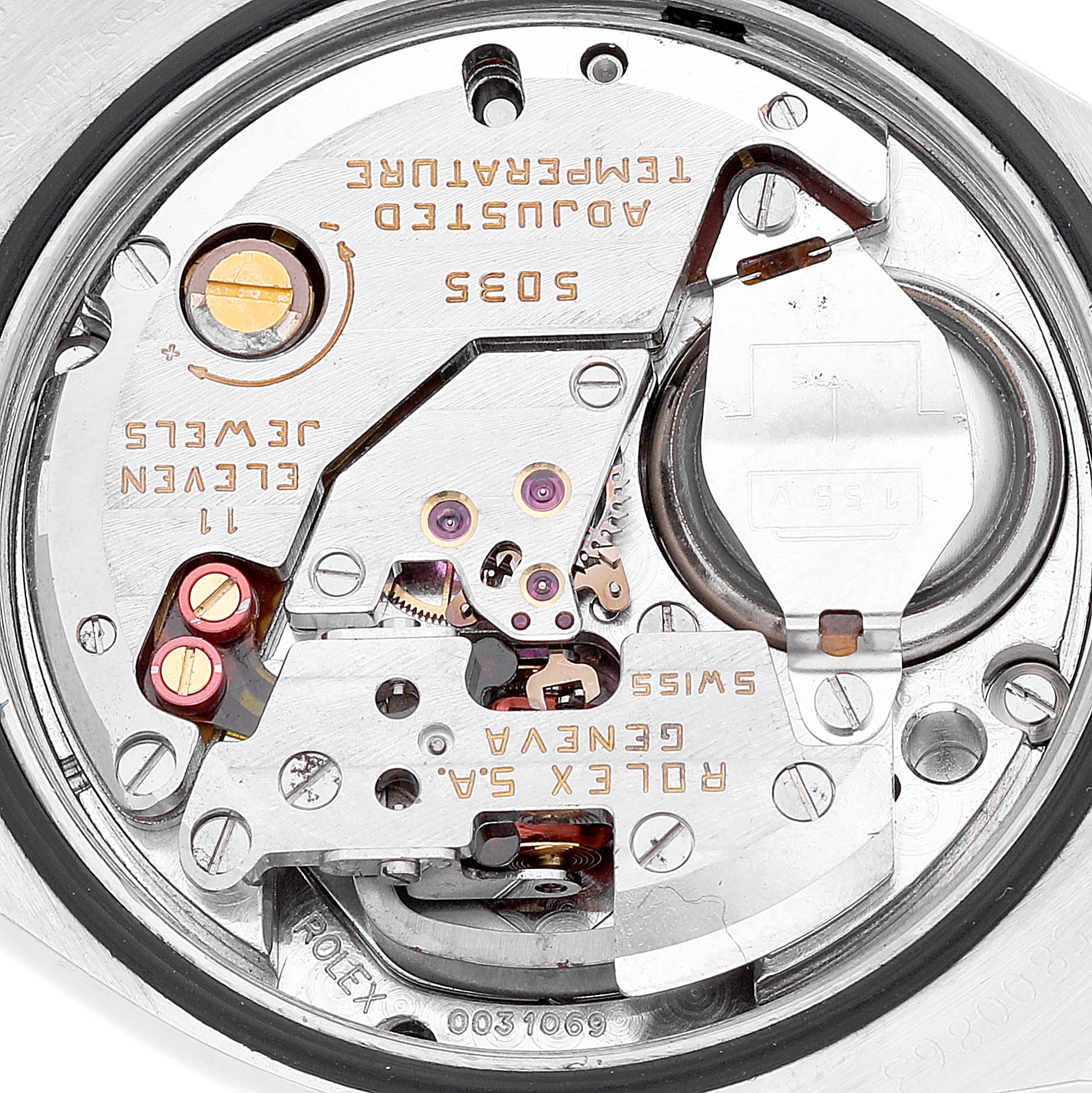 This is a close-up view of the movement inside a Rolex Oysterquartz 17013 Men's Steel and Gold (two tone) Champagne Dial 17013 Men's Steel and Gold (two tone) Champagne Dial watch model, showing the intricate mechanical parts.