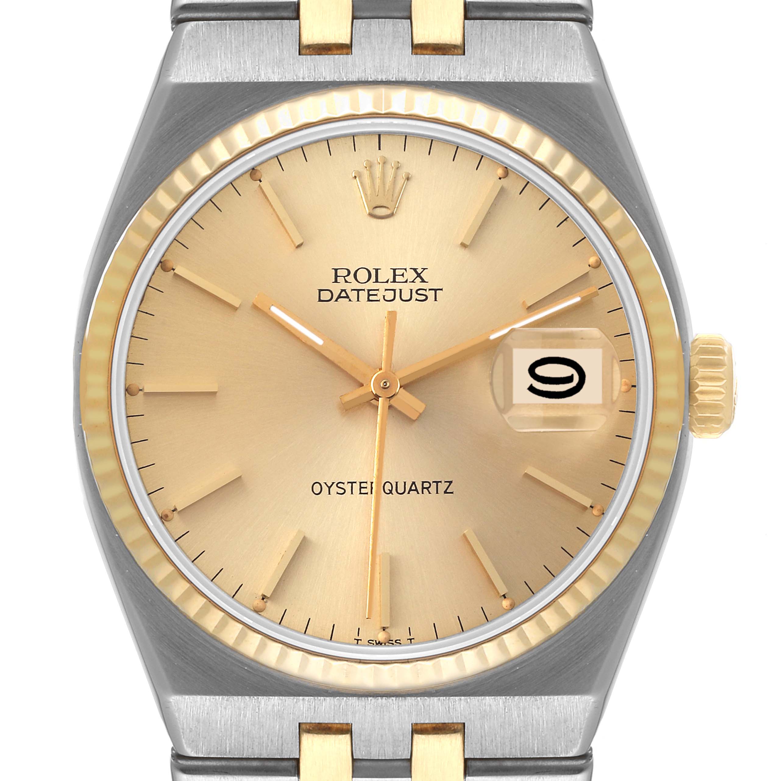 This image shows a front view of a Rolex Oysterquartz 17013 Men's Steel and Gold (two tone) Champagne Dial 17013 Men's Steel and Gold (two tone) Champagne Dial Datejust, highlighting the dial, bezel, and part of the bracelet.
