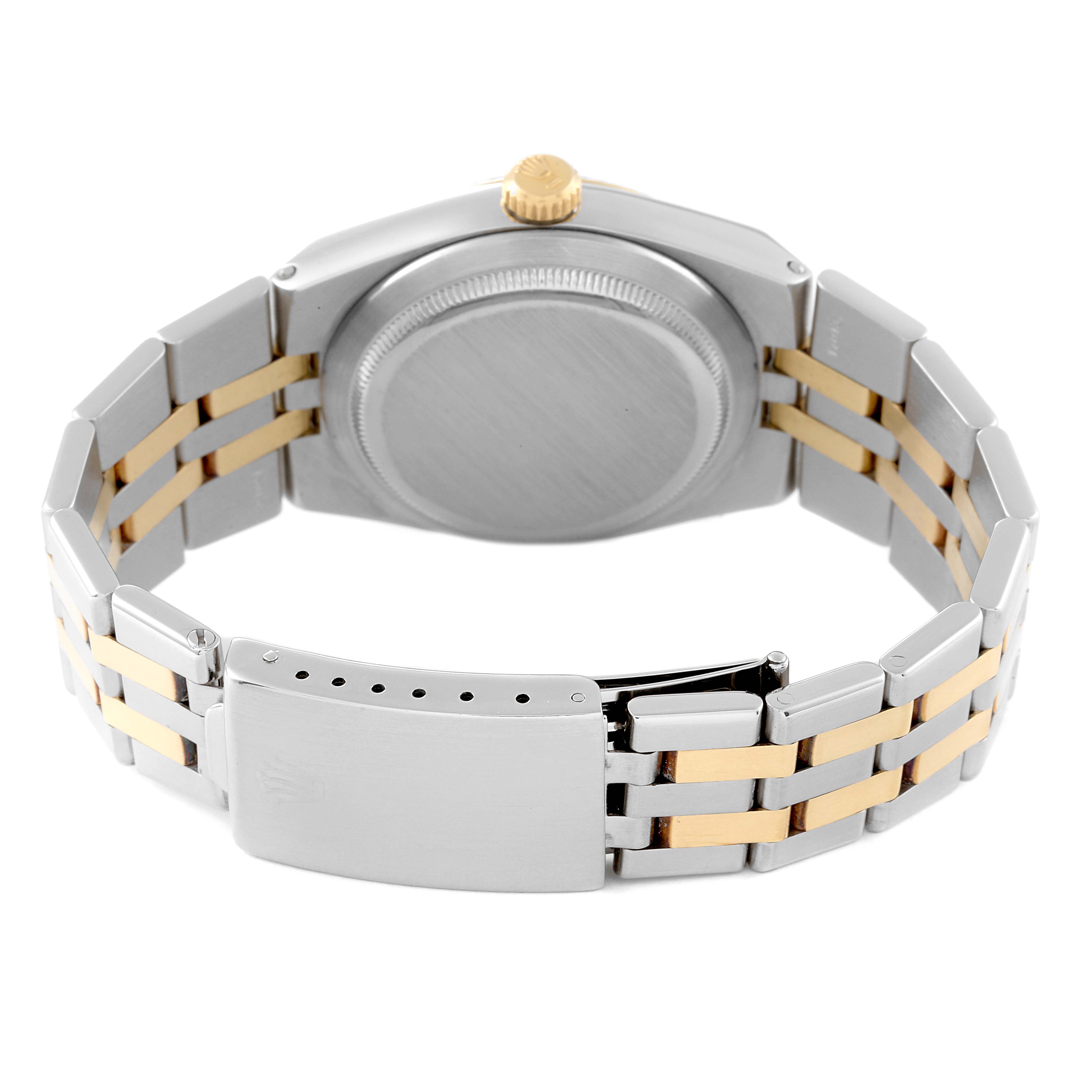 This image shows the back view of a Rolex Oysterquartz 17013 Men's Steel and Gold (two tone) Champagne Dial 17013 Men's Steel and Gold (two tone) Champagne Dial watch, highlighting the case back and the metal bracelet.