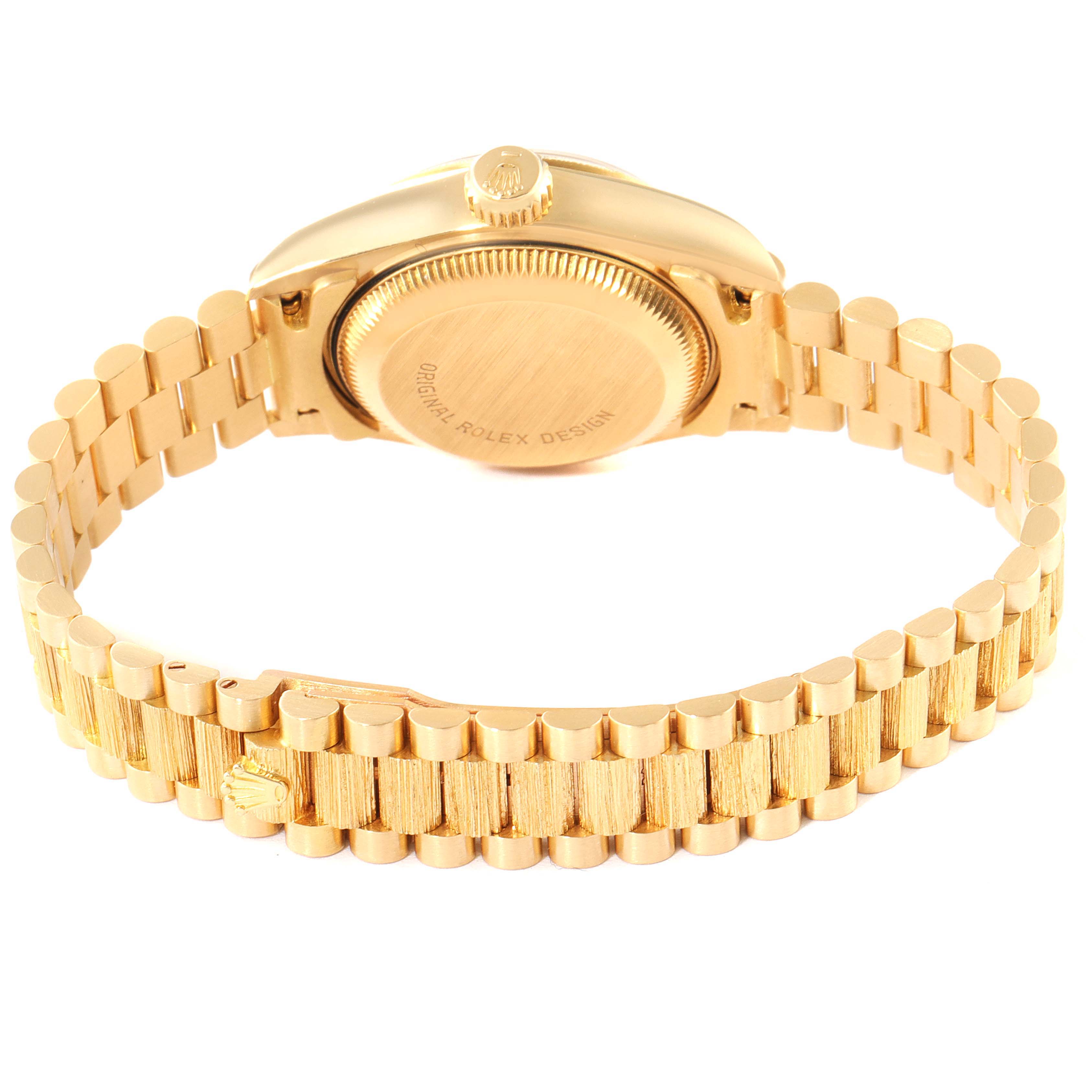 This image shows the back view of the Rolex President 69278 Women
s Yellow Gold White Dial 69278 Women
s Yellow Gold White Dial model watch, highlighting its bracelet and case back.