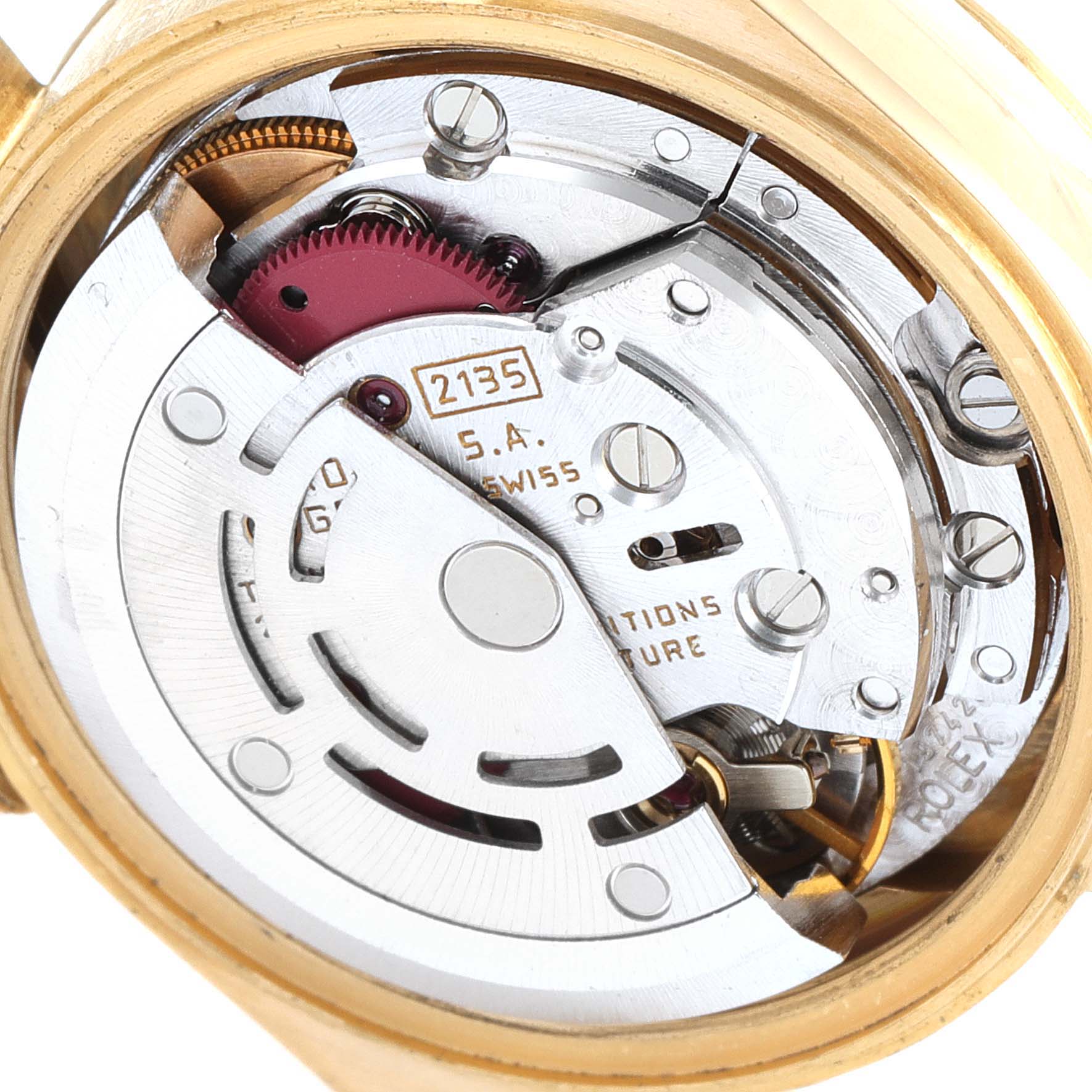 The image shows the intricate internal mechanism of a Rolex President 69278 Women
s Yellow Gold White Dial 69278 Women
s Yellow Gold White Dial model watch from a close-up, top-down angle.