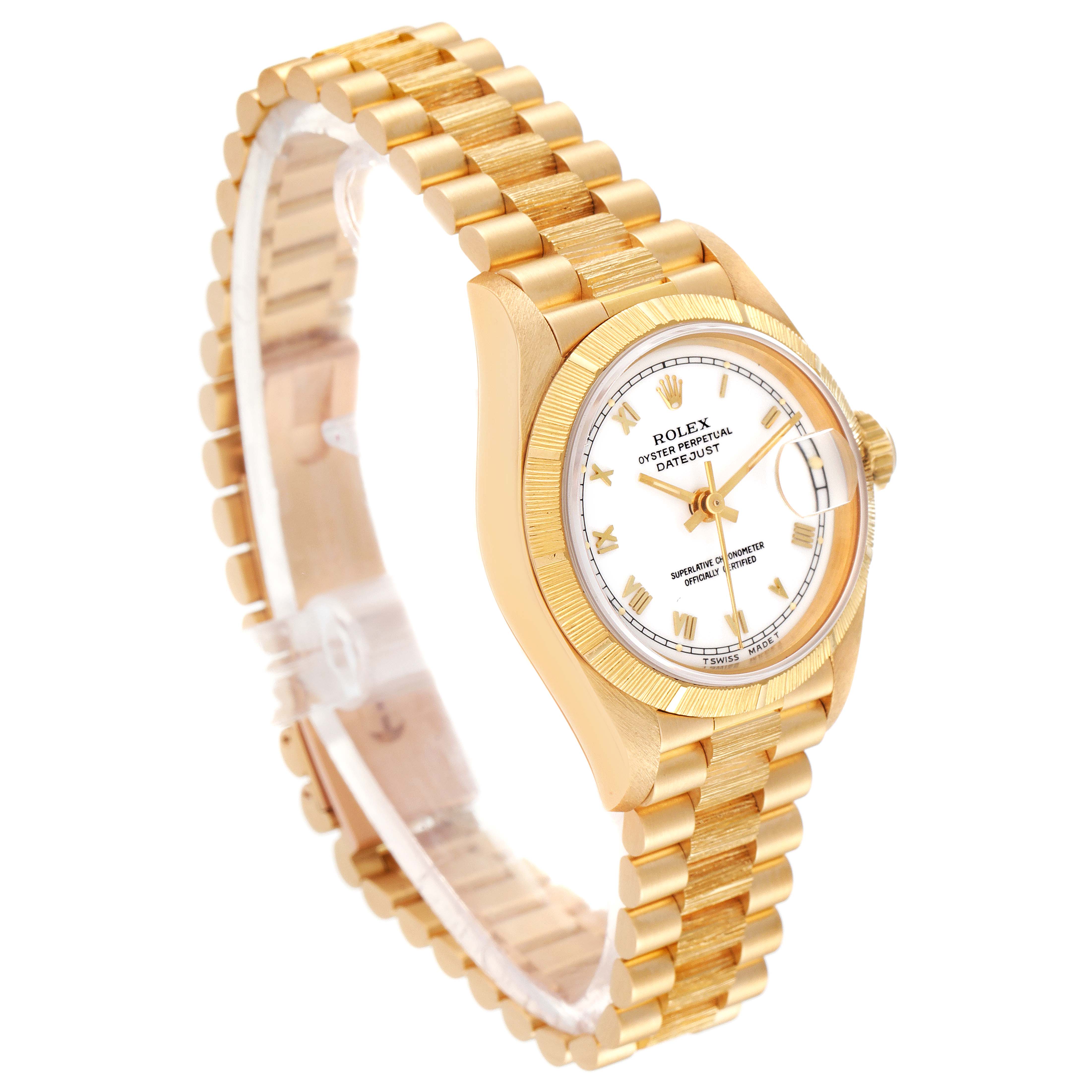 The image shows a Rolex President 69278 Women
s Yellow Gold White Dial 69278 Women
s Yellow Gold White Dial watch from a three-quarter angle highlighting the dial, bezel, case, and bracelet.
