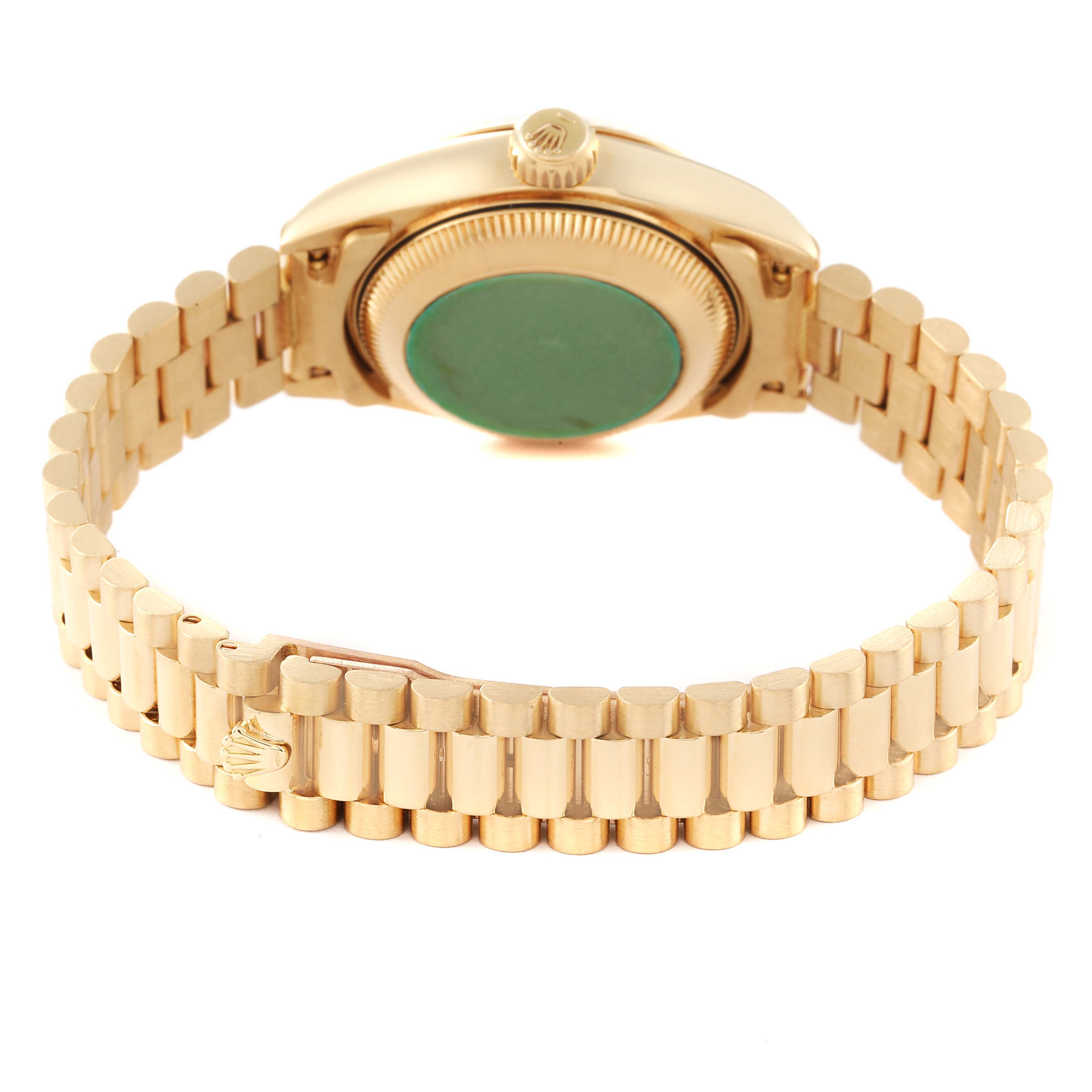 The image shows the back view of a Rolex President 69178 Women
s Yellow Gold Champagne Dial 69178 Women
s Yellow Gold Champagne Dial model watch, highlighting the bracelet and case back.