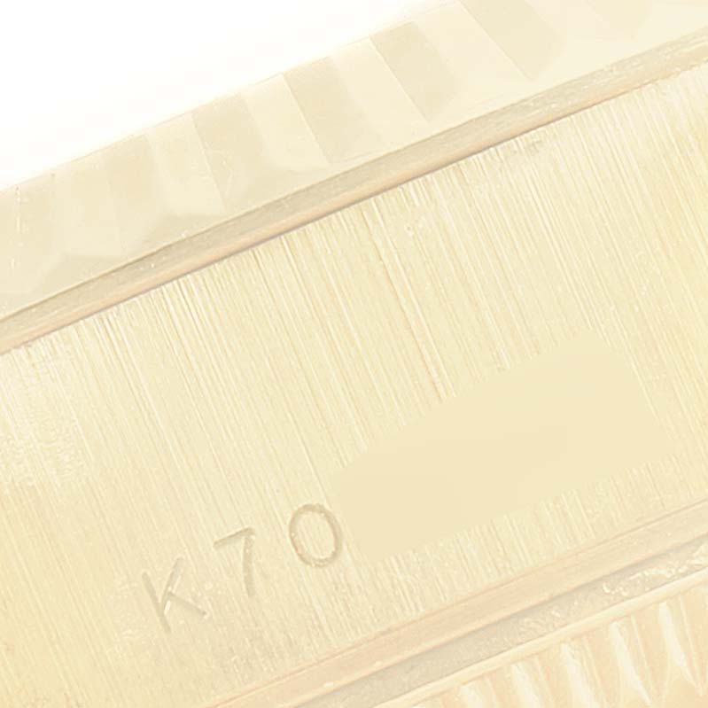 This image shows a close-up angle of the Rolex President 79178 Women
s Yellow Gold Champagne Dial 79178 Women
s Yellow Gold Champagne Dial model, focusing on the edge detail and part of the serial number.