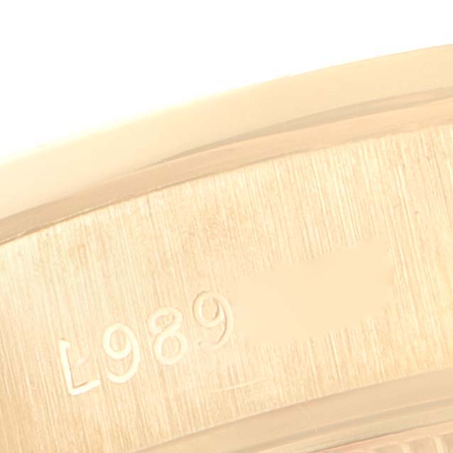 This image shows a close-up of the inner part of the case back of a Rolex President 69138 Women
s Yellow Gold Champagne Dial 69138 Women
s Yellow Gold Champagne Dial model watch.